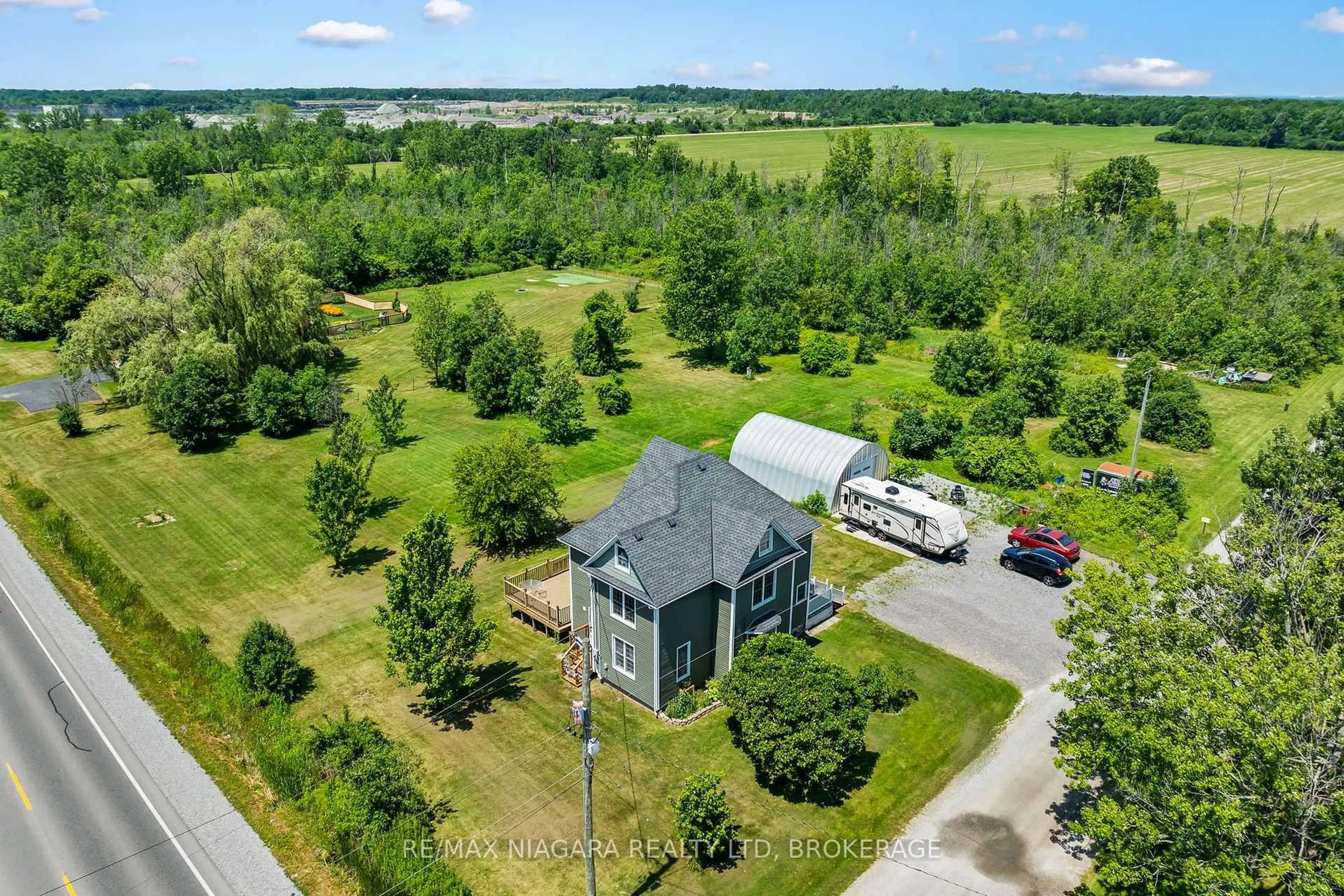 A pic from outside/outdoor area/front of a property/back of a property/a pic from drone, water/lake/river/ocean view for 20214 Hwy 3, Wainfleet Ontario L0S 1V0