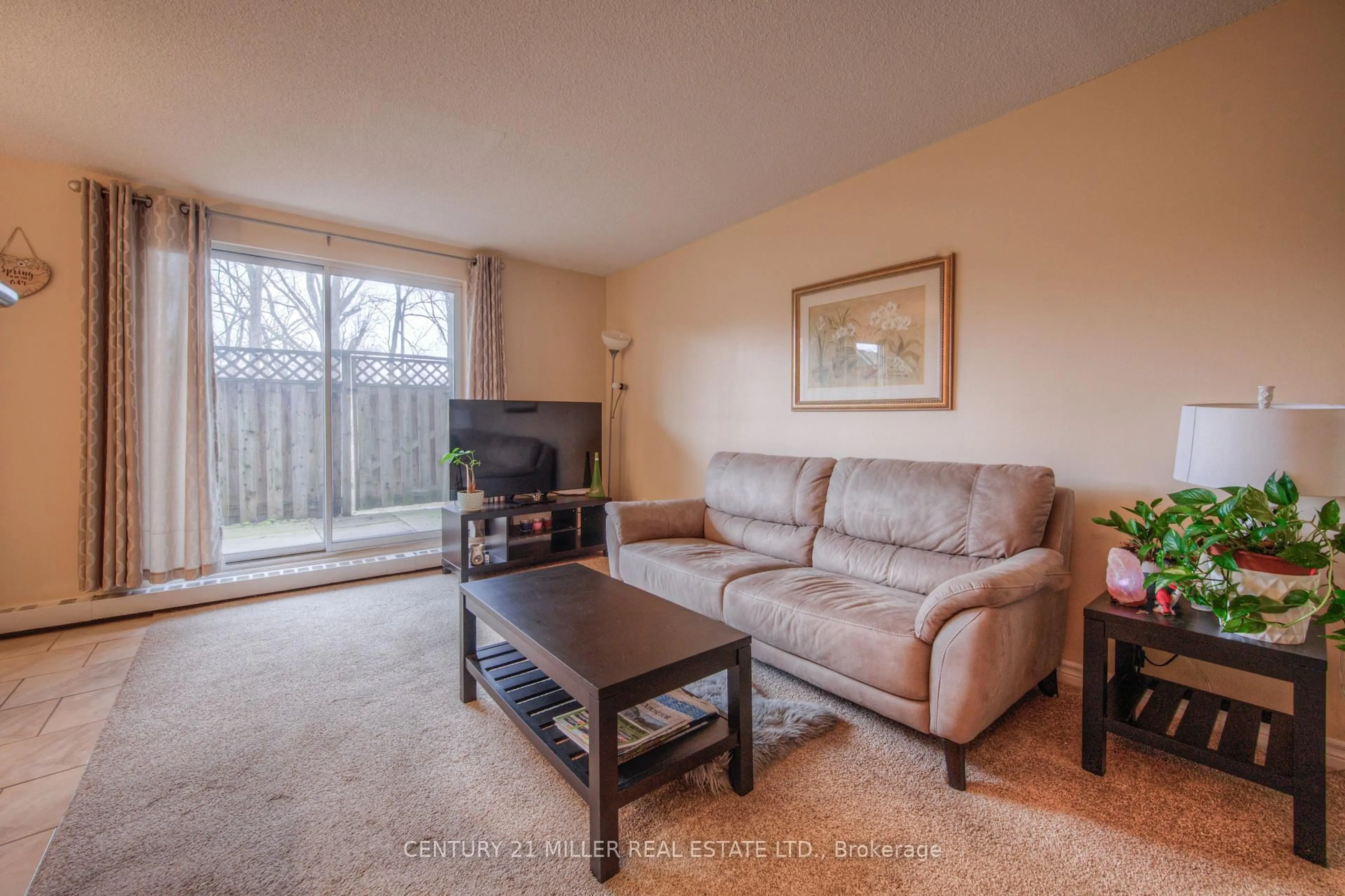 Living room with furniture, unknown for 793 Colborne St #110, Brantford Ontario N3S 7J3