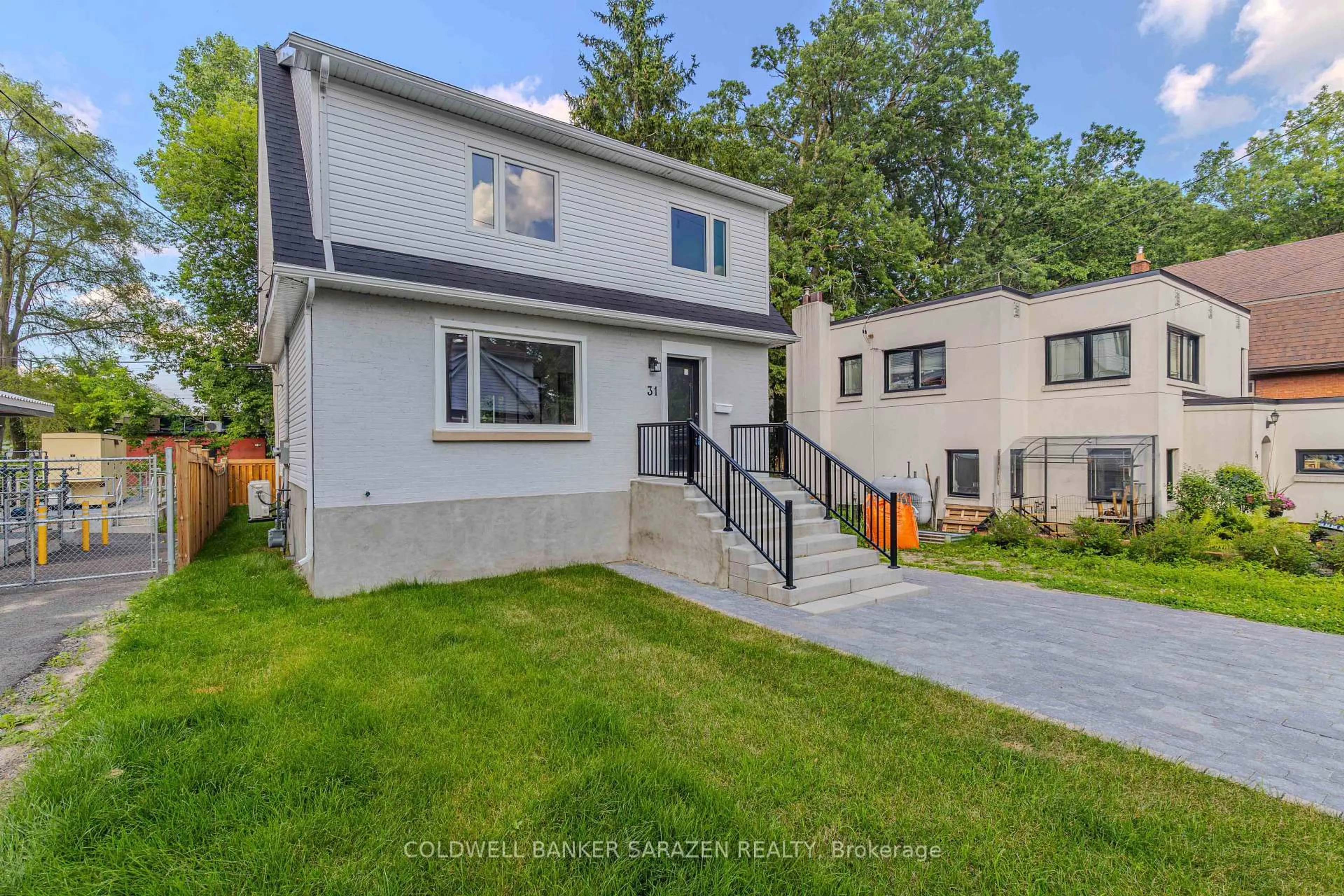 Home with vinyl exterior material, street for 31 Harvard Ave, Ottawa Ontario K1S 4Z2