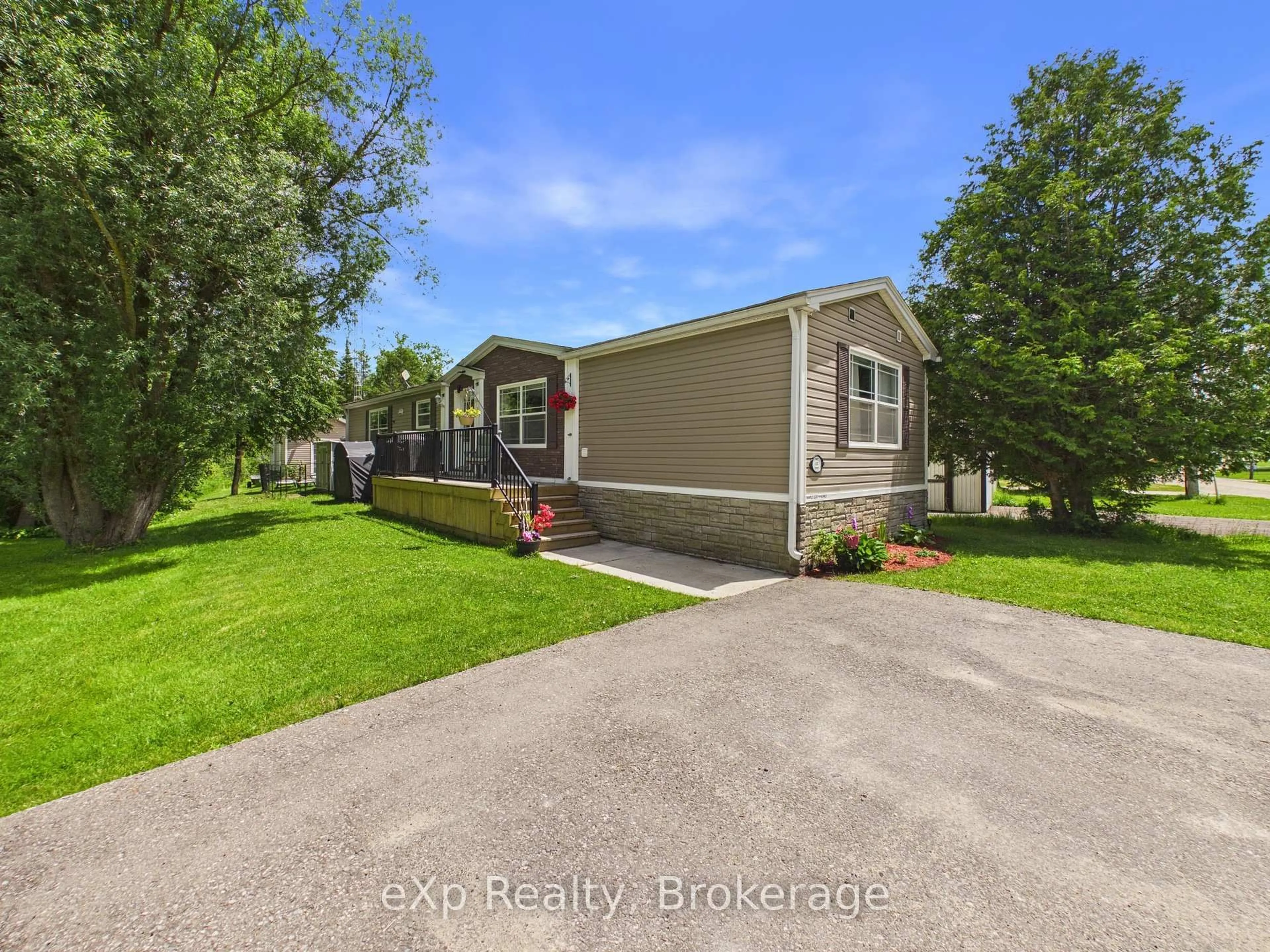 A pic from outside/outdoor area/front of a property/back of a property/a pic from drone, water/lake/river/ocean view for 32 Maple Grove Village Rd, Southgate Ontario N0C 1B0