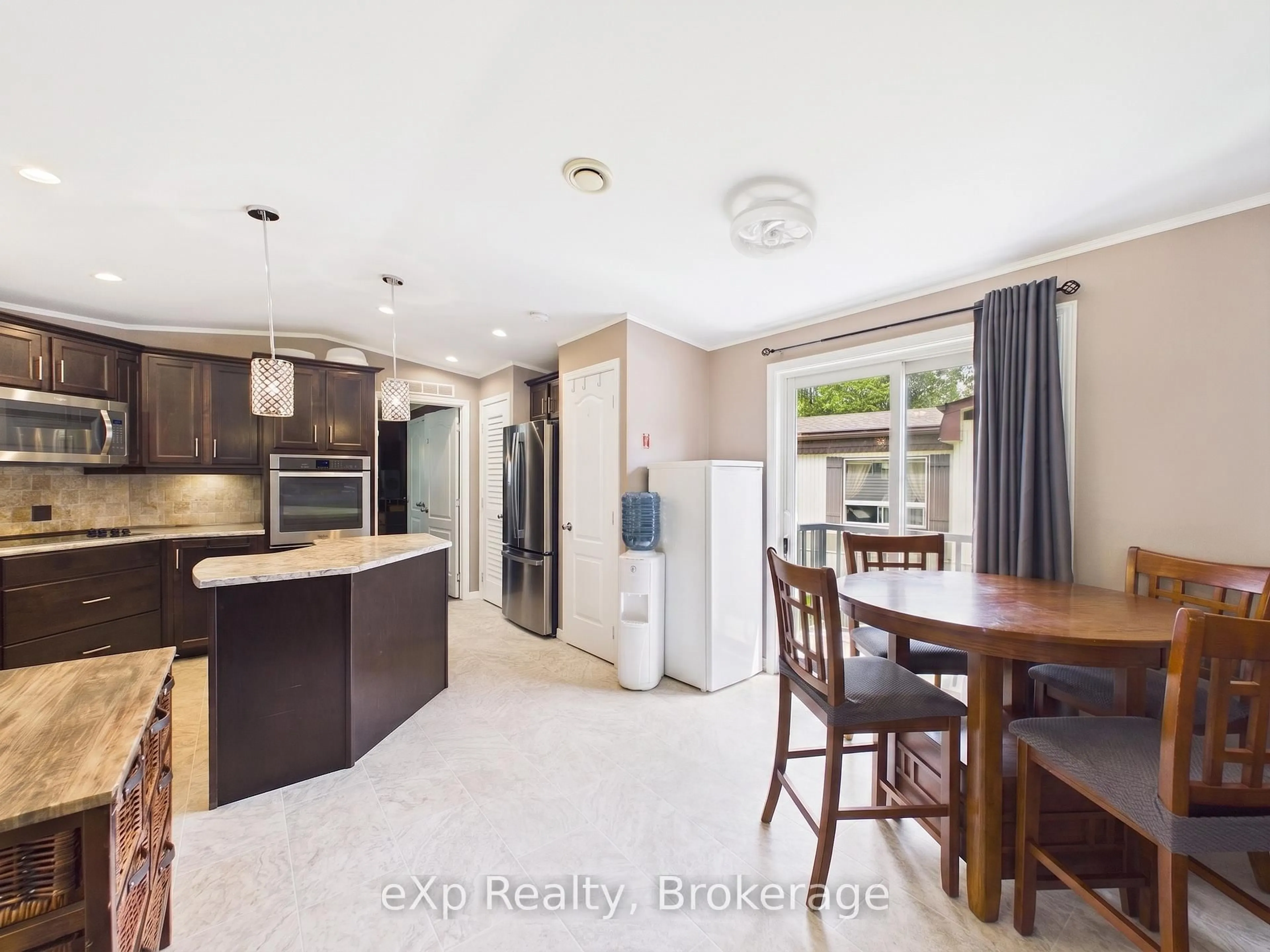 Open concept kitchen, ceramic/tile floor for 32 Maple Grove Village Rd, Southgate Ontario N0C 1B0