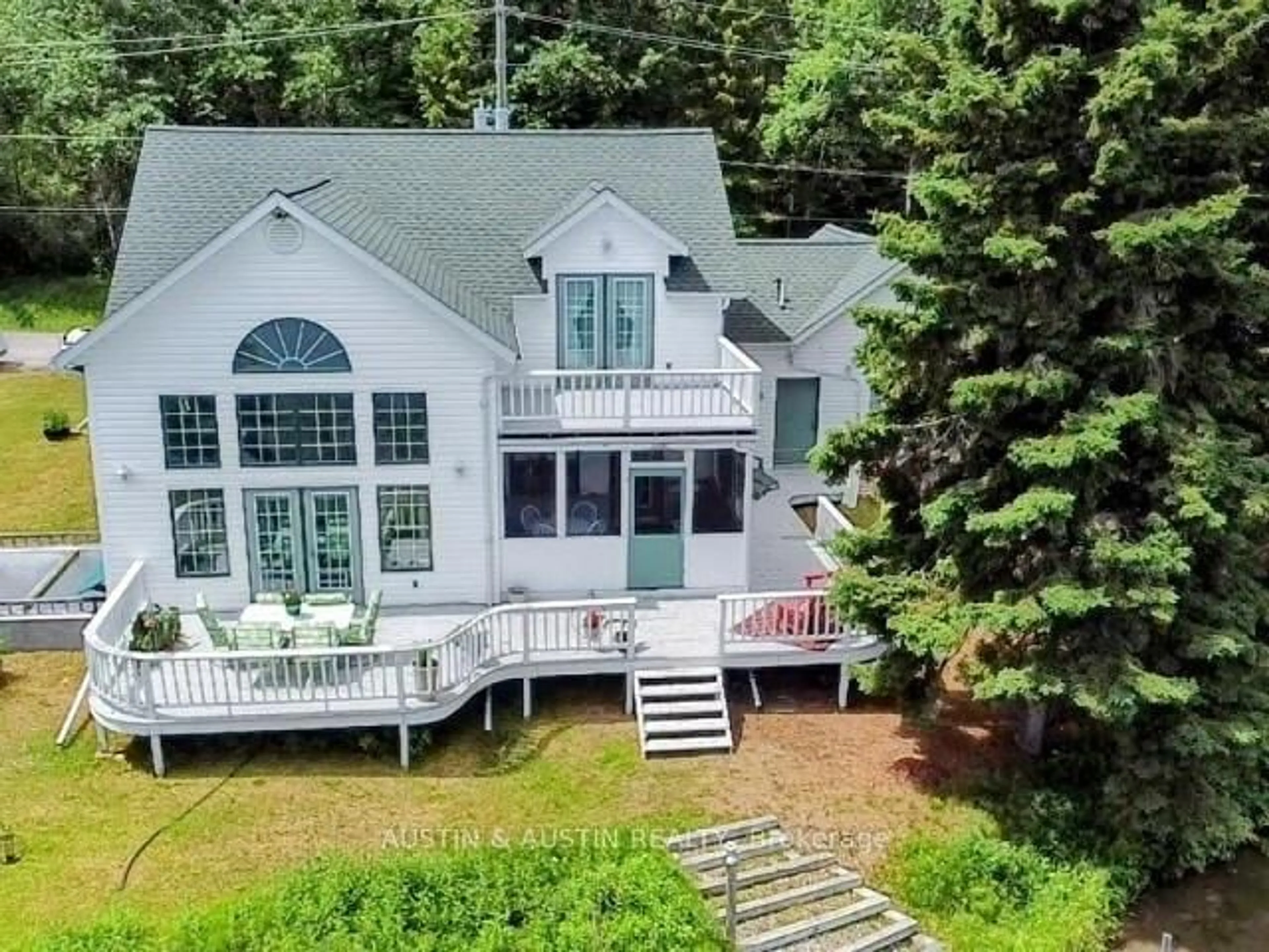 A pic from outside/outdoor area/front of a property/back of a property/a pic from drone, water/lake/river/ocean view for 227 West River Rd, Dryden Ontario P0V 2J0