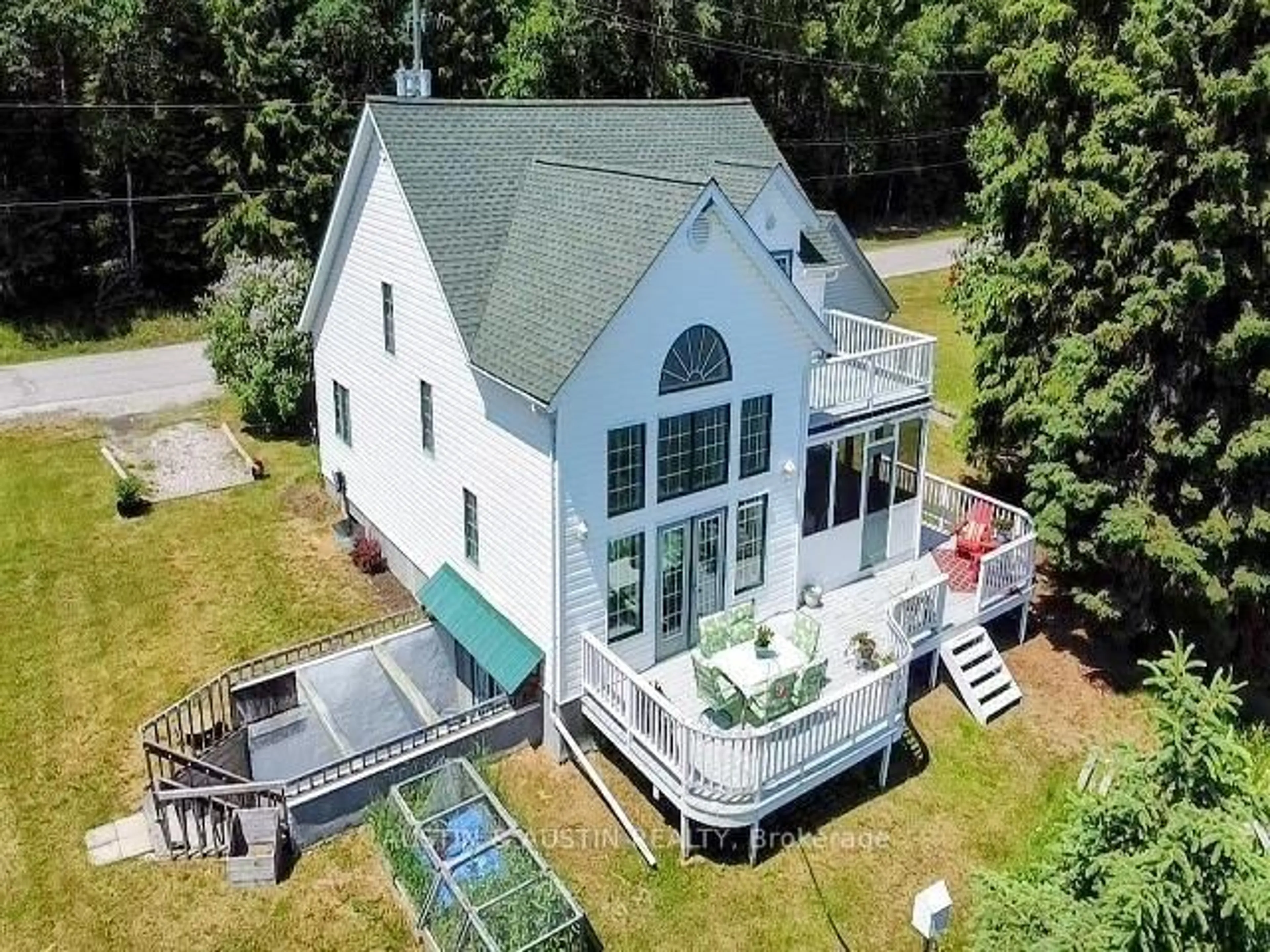 A pic from outside/outdoor area/front of a property/back of a property/a pic from drone, water/lake/river/ocean view for 227 West River Rd, Dryden Ontario P0V 2J0
