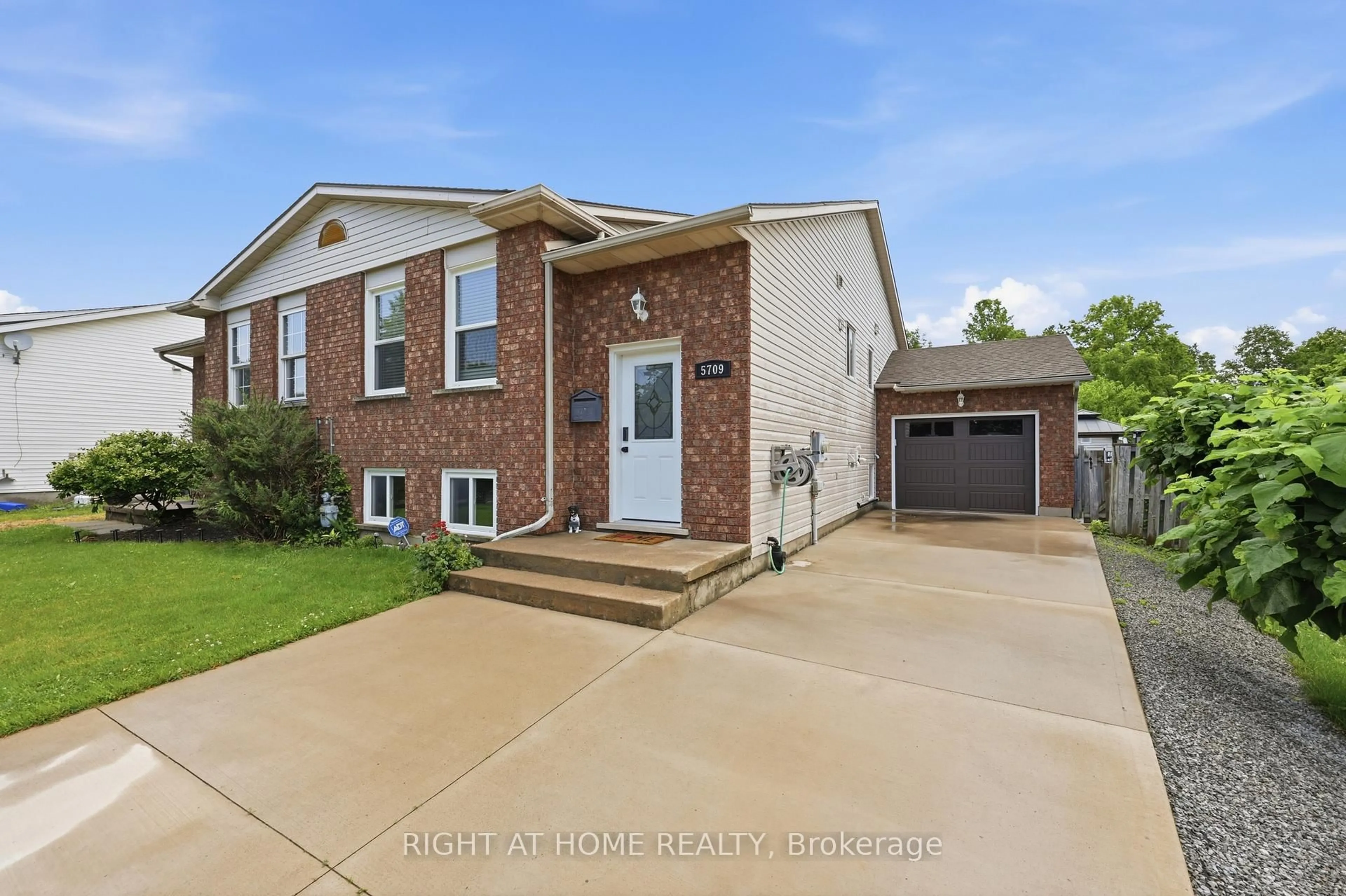 Home with brick exterior material, street for 5709 Deerbrook St, Niagara Falls Ontario L2G 7V6