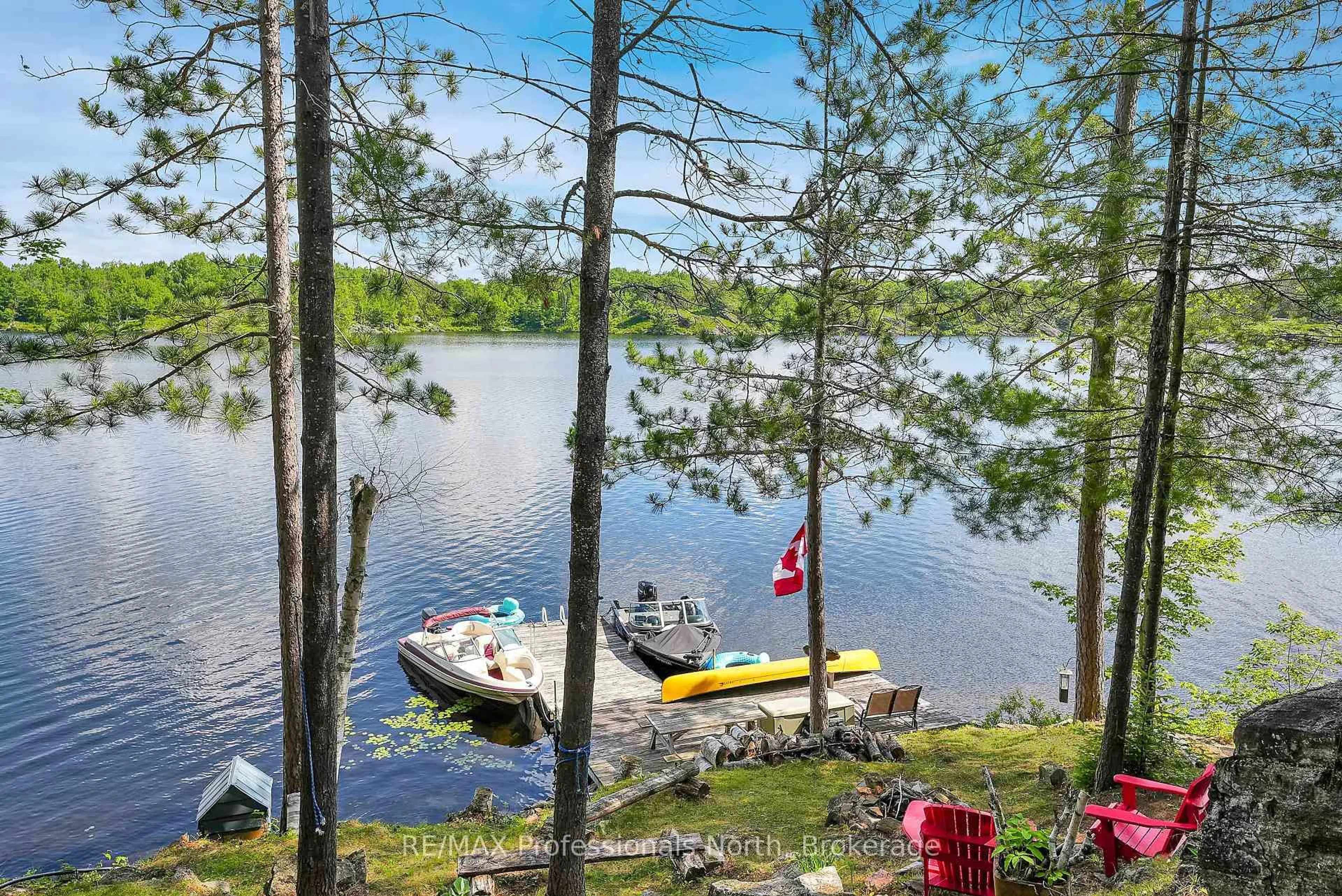 A pic from outside/outdoor area/front of a property/back of a property/a pic from drone, water/lake/river/ocean view for 10549 Devil's Lake WAO, Minden Hills Ontario K0M 2K0