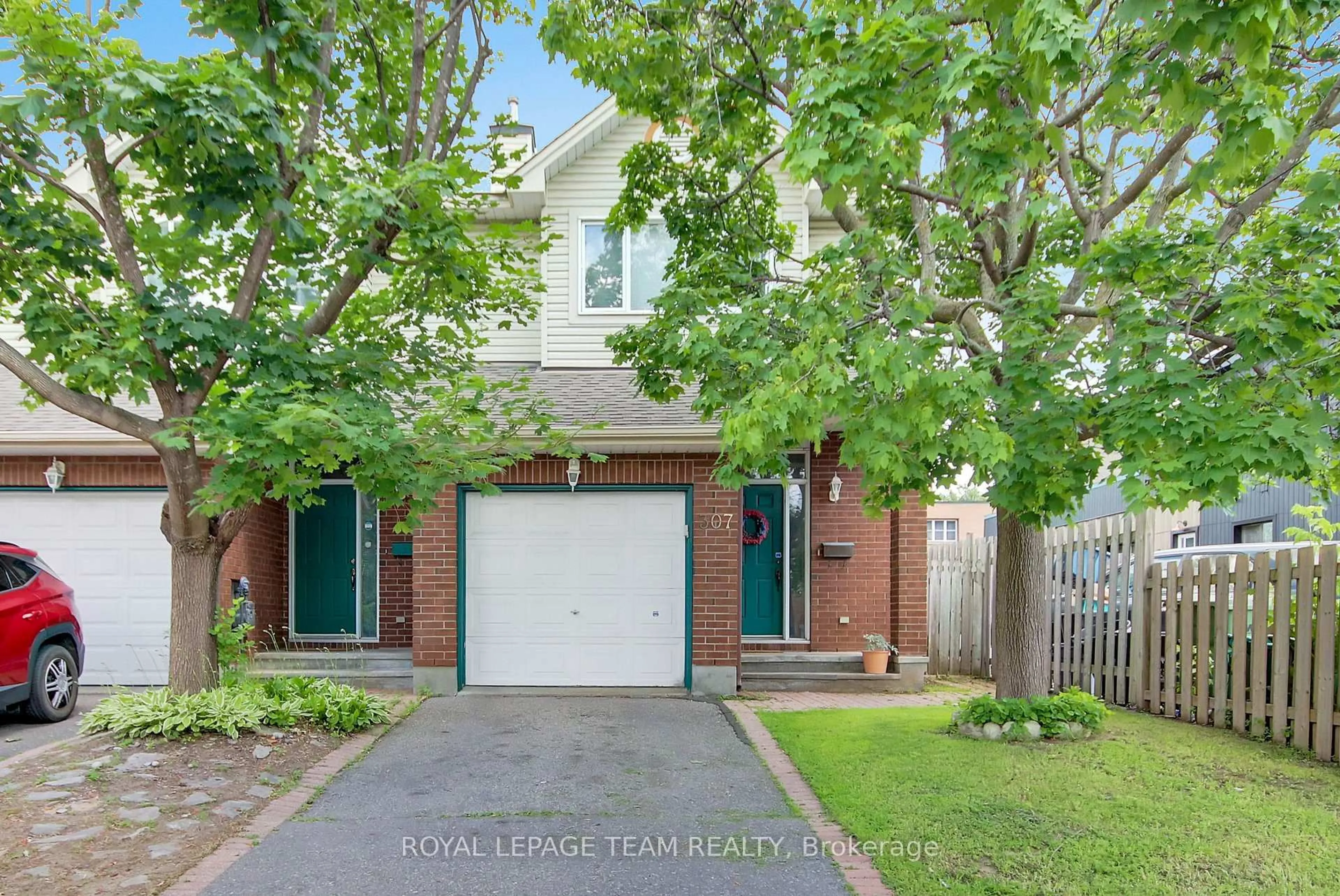 Home with brick exterior material, street for 307 Cyr Ave, Ottawa Ontario K1L 7N6