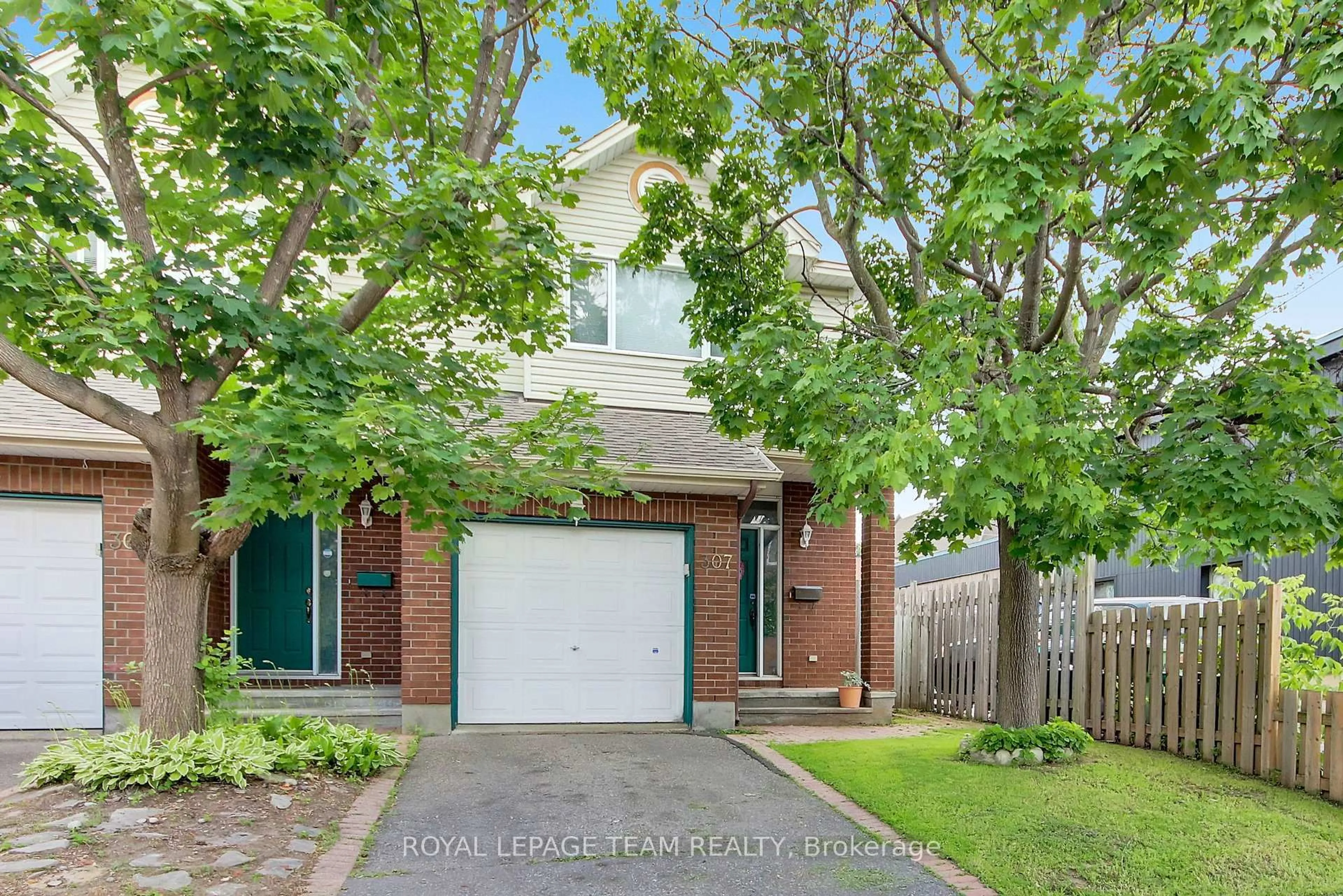 A pic from outside/outdoor area/front of a property/back of a property/a pic from drone, street for 307 Cyr Ave, Ottawa Ontario K1L 7N6
