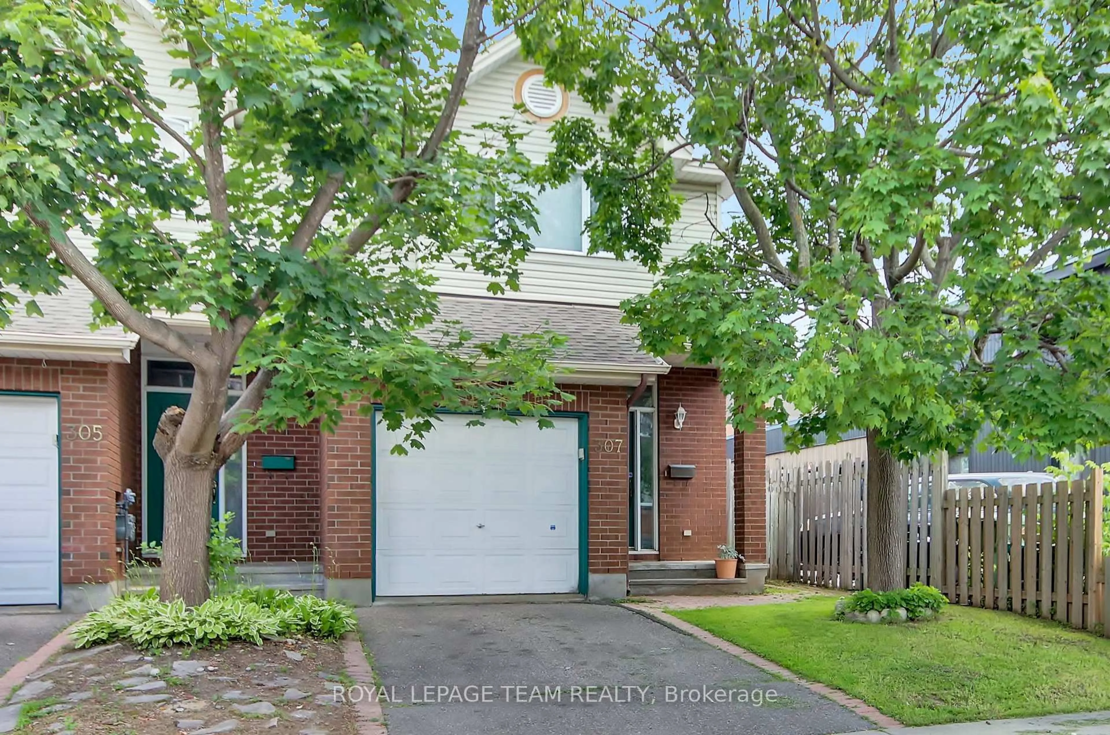 Home with brick exterior material, street for 307 Cyr Ave, Ottawa Ontario K1L 7N6