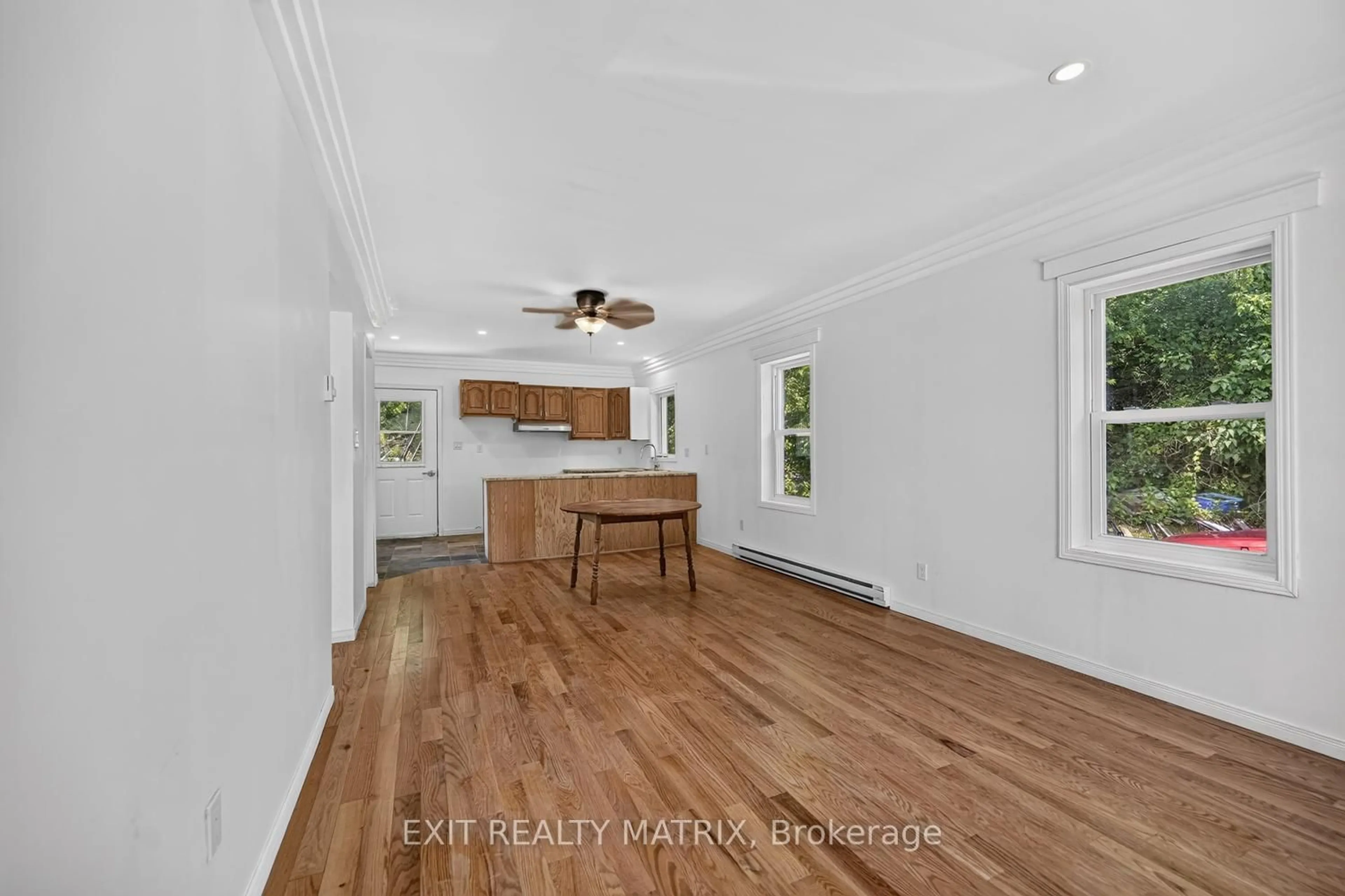 Open concept kitchen, wood/laminate floor for 96 George St, Lanark Ontario K0G 1K0