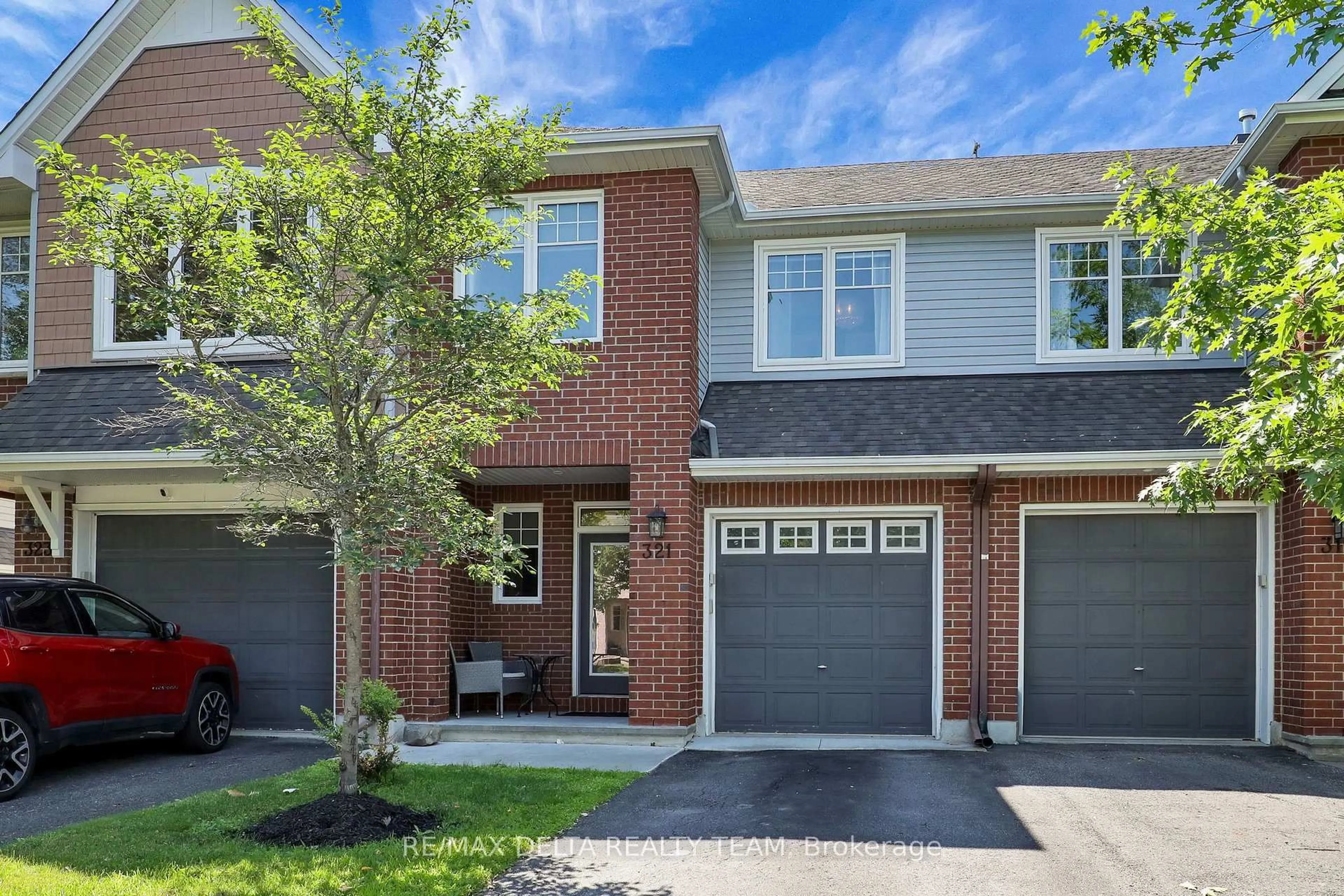 Home with brick exterior material, street for 321 Widgeon Way, Ottawa Ontario K1T 0G1