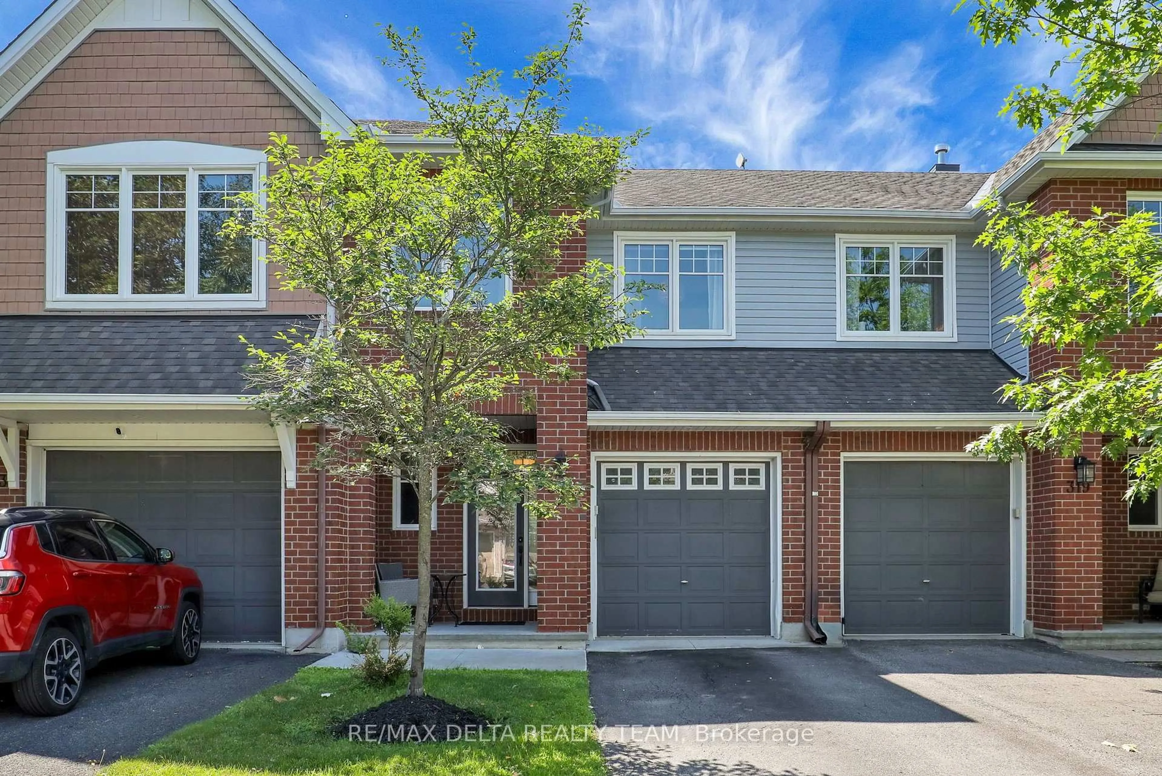 Home with brick exterior material, street for 321 Widgeon Way, Ottawa Ontario K1T 0G1