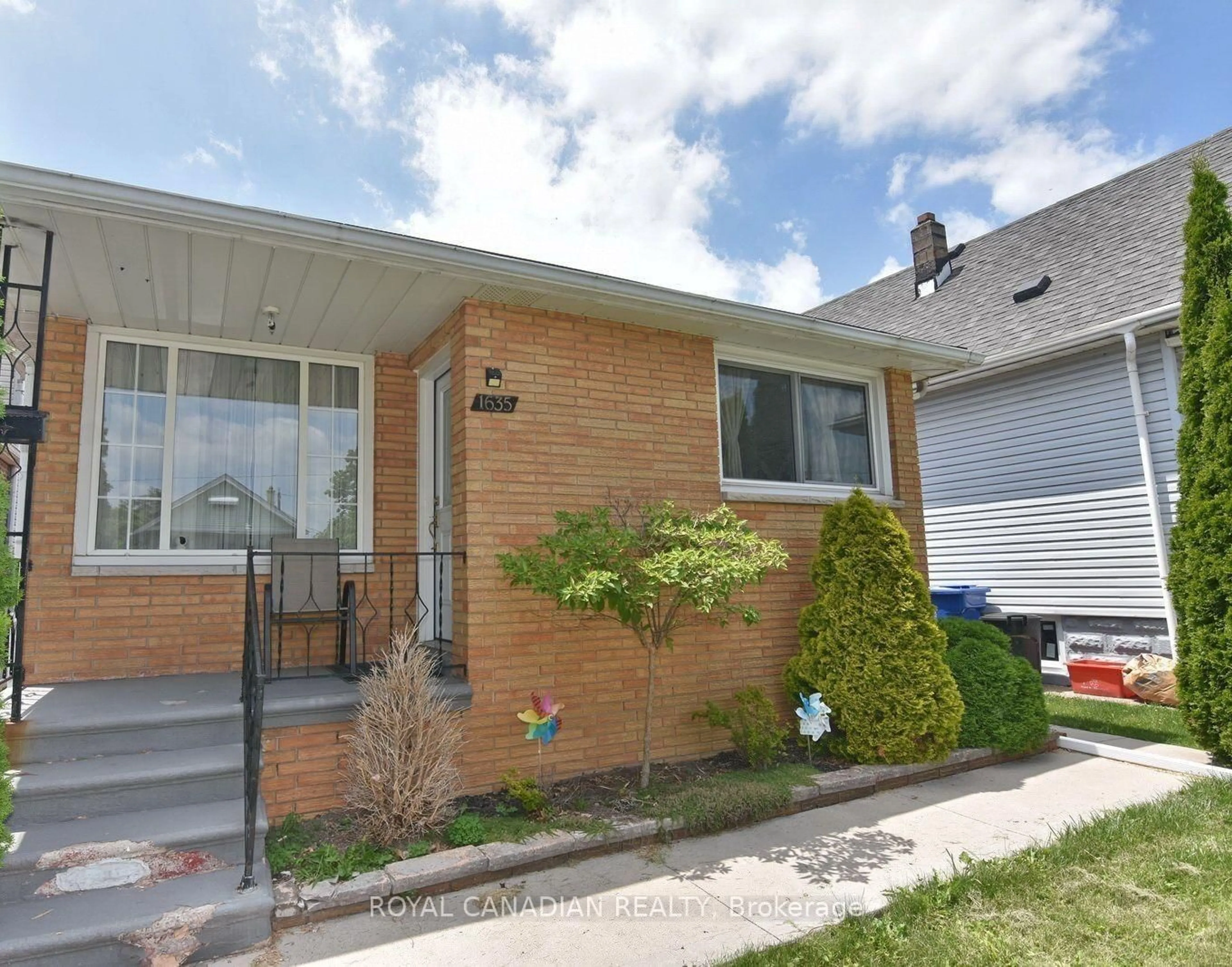Home with brick exterior material, street for 1635 Elsmere Ave, Windsor Ontario N8X 4H5
