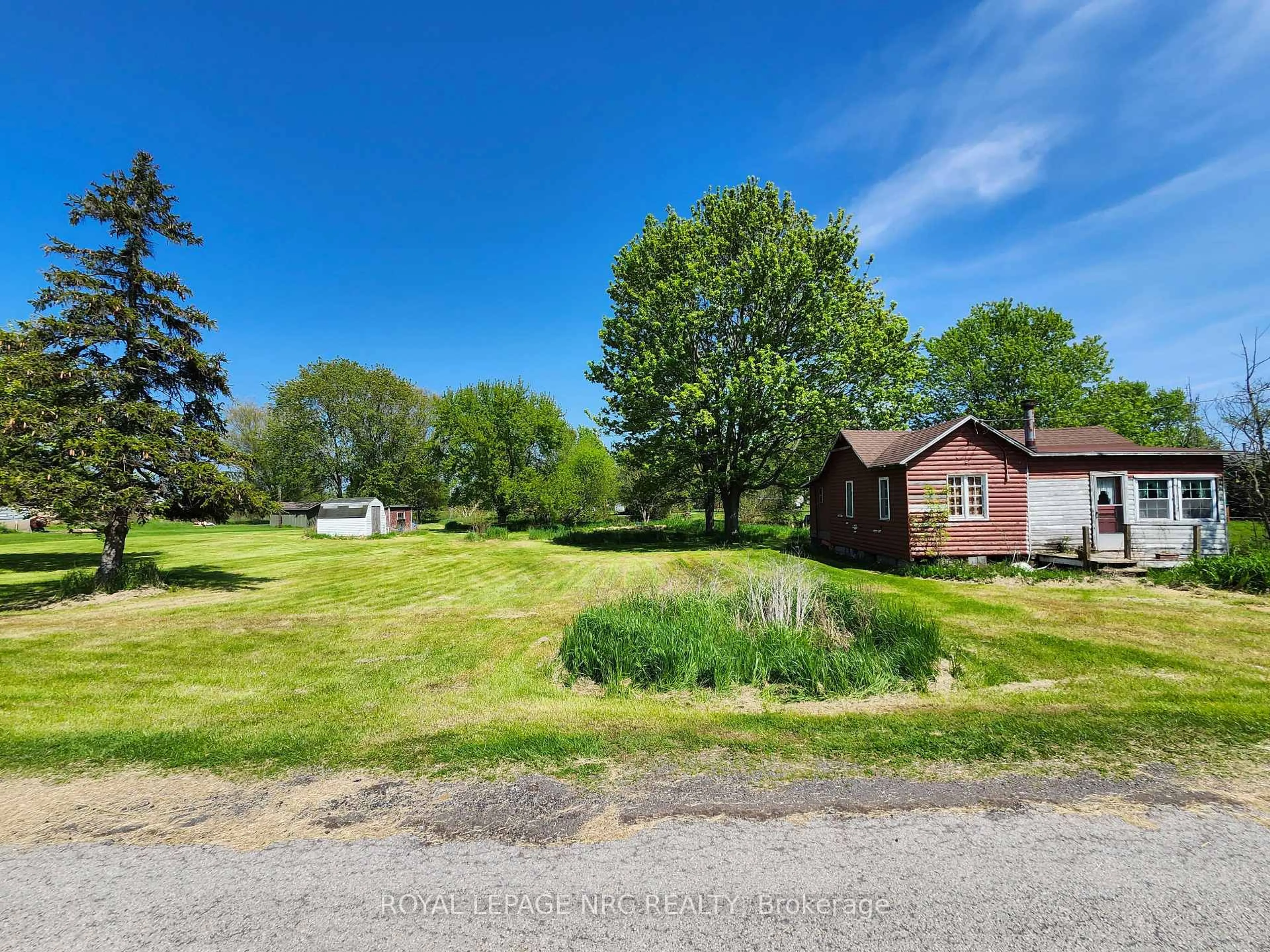 A pic from outside/outdoor area/front of a property/back of a property/a pic from drone, street for 11807 Sideroad 18 Rd, Wainfleet Ontario L0S 1V0