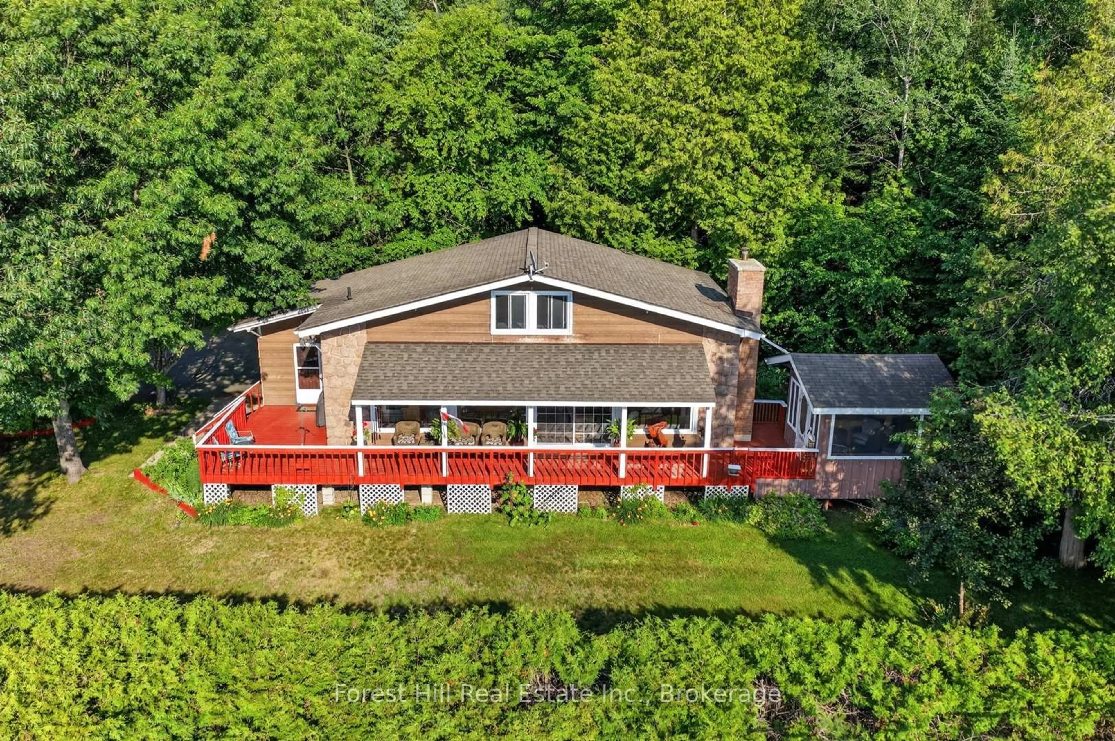 A pic from outside/outdoor area/front of a property/back of a property/a pic from drone, unknown for 1117 Main St, Algonquin Highlands Ontario P0A 1E0