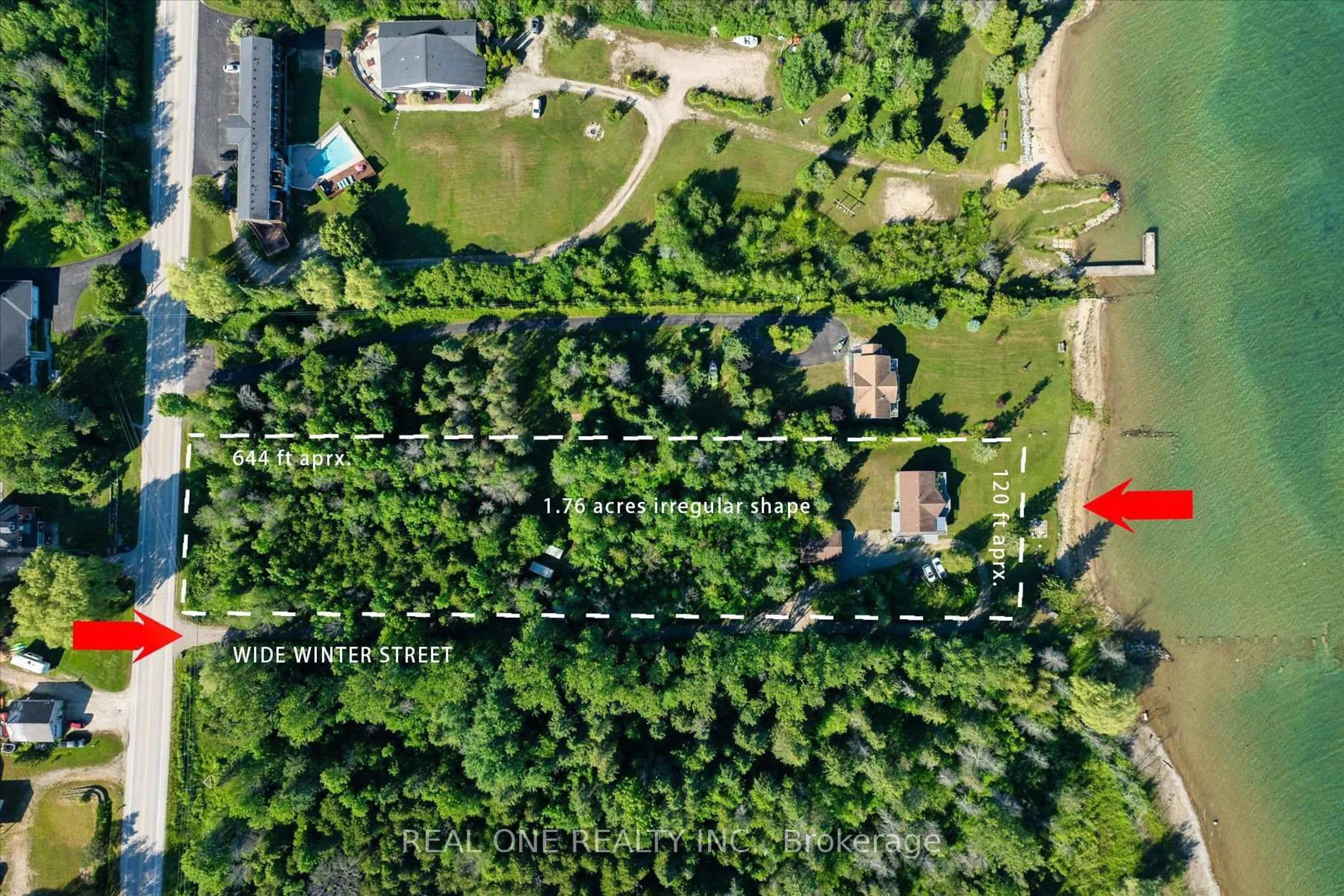 A pic from outside/outdoor area/front of a property/back of a property/a pic from drone, forest/trees view for 501219 Grey Road 1 Rd, Georgian Bluffs Ontario N0H 2T0