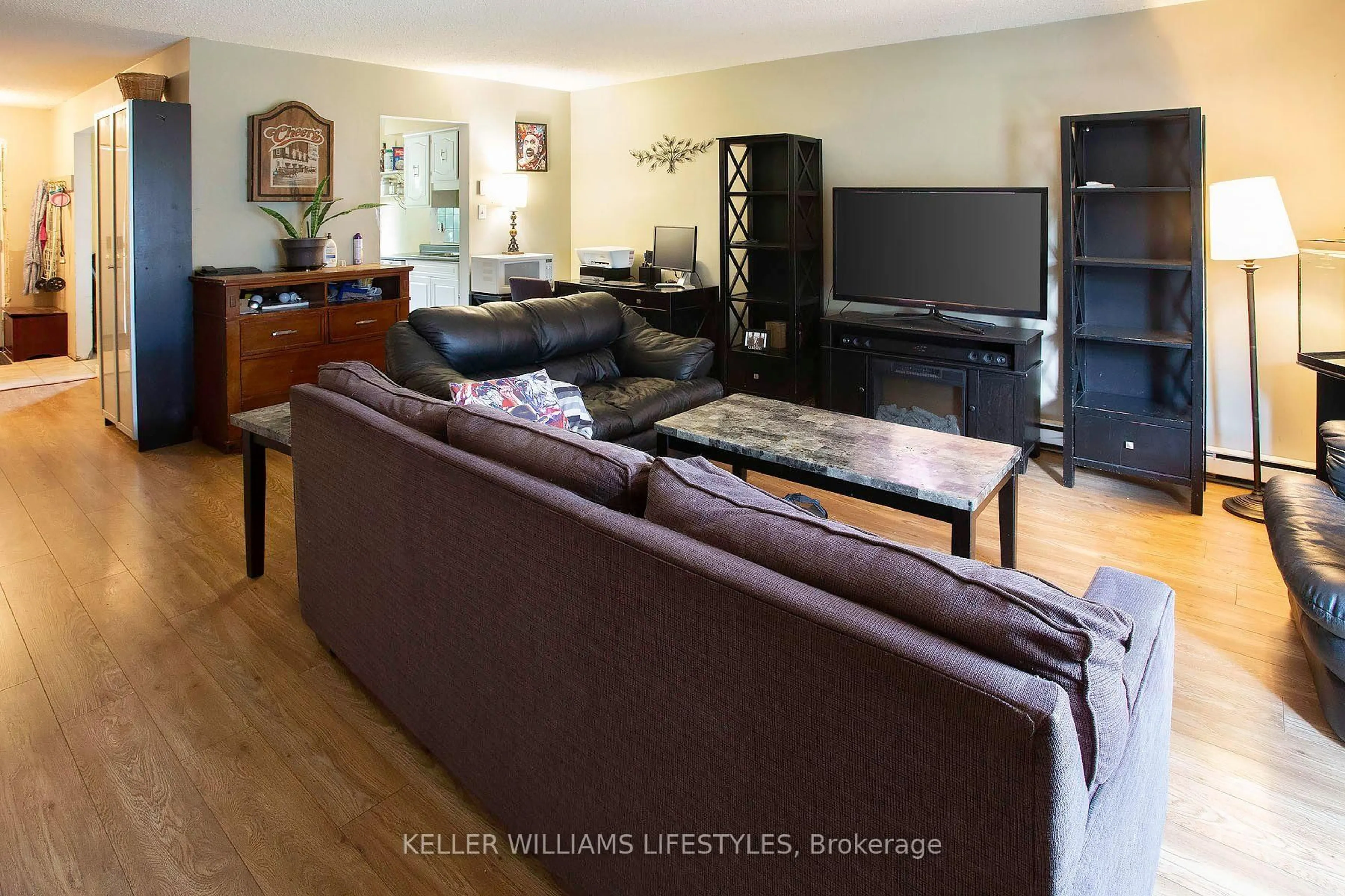 Living room with furniture, wood/laminate floor for 120 Monmore Rd, London North Ontario N6G 3A6