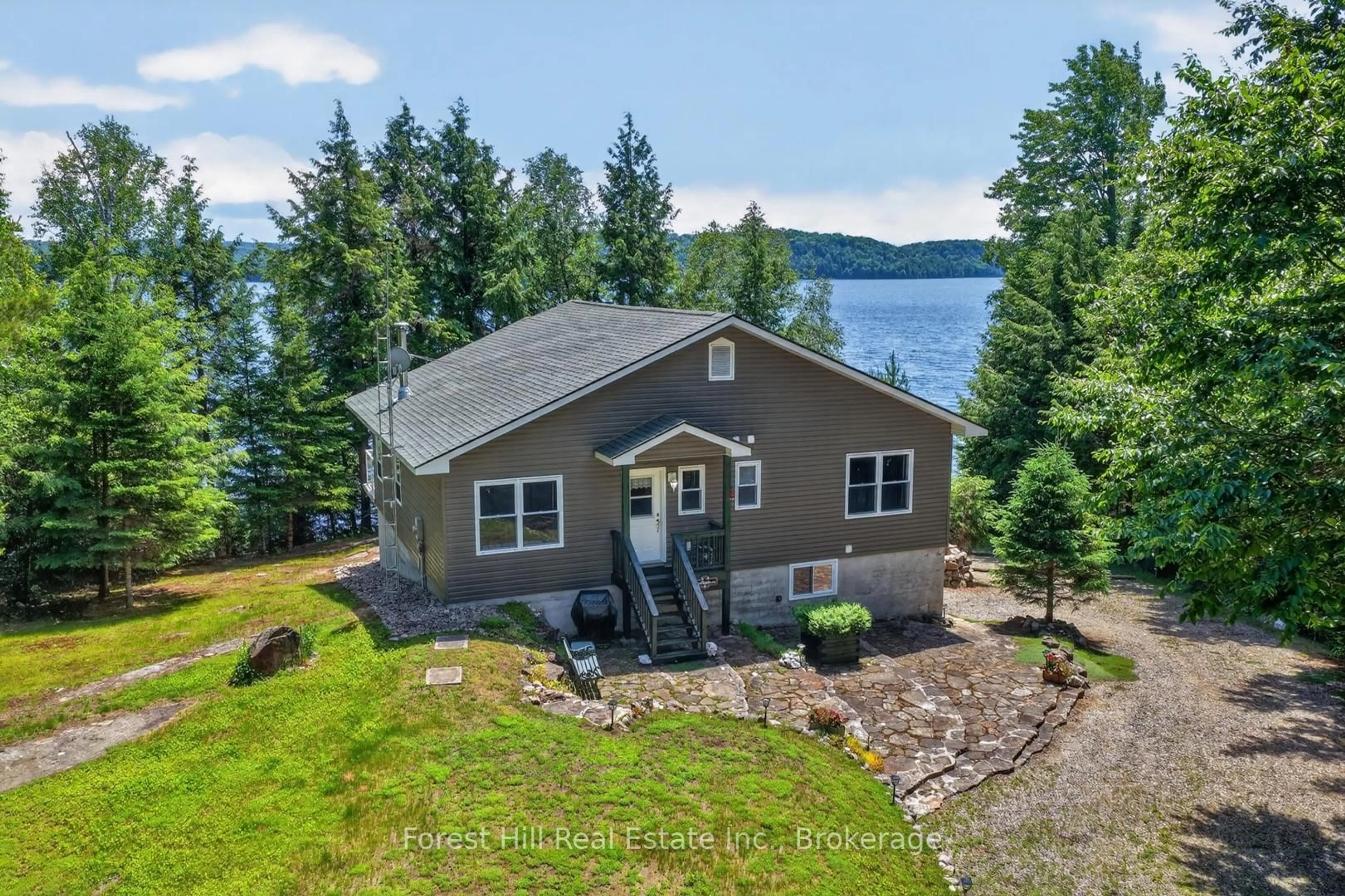 A pic from outside/outdoor area/front of a property/back of a property/a pic from drone, water/lake/river/ocean view for 1291 Creighton Dr, Algonquin Highlands Ontario P0A 1E0
