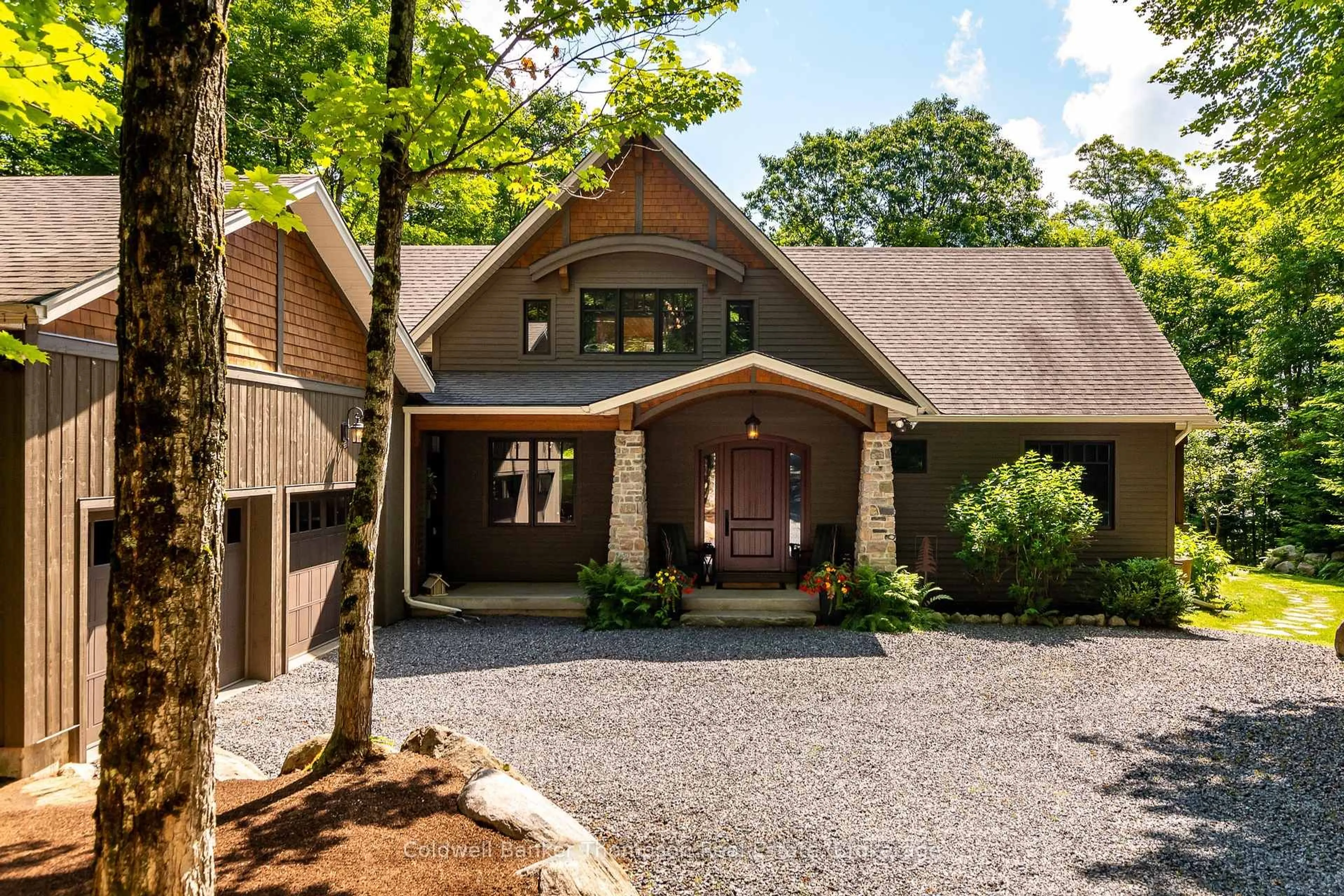 Home with brick exterior material, street for 11 Forest Hill Lane, Huntsville Ontario P1H 2N5