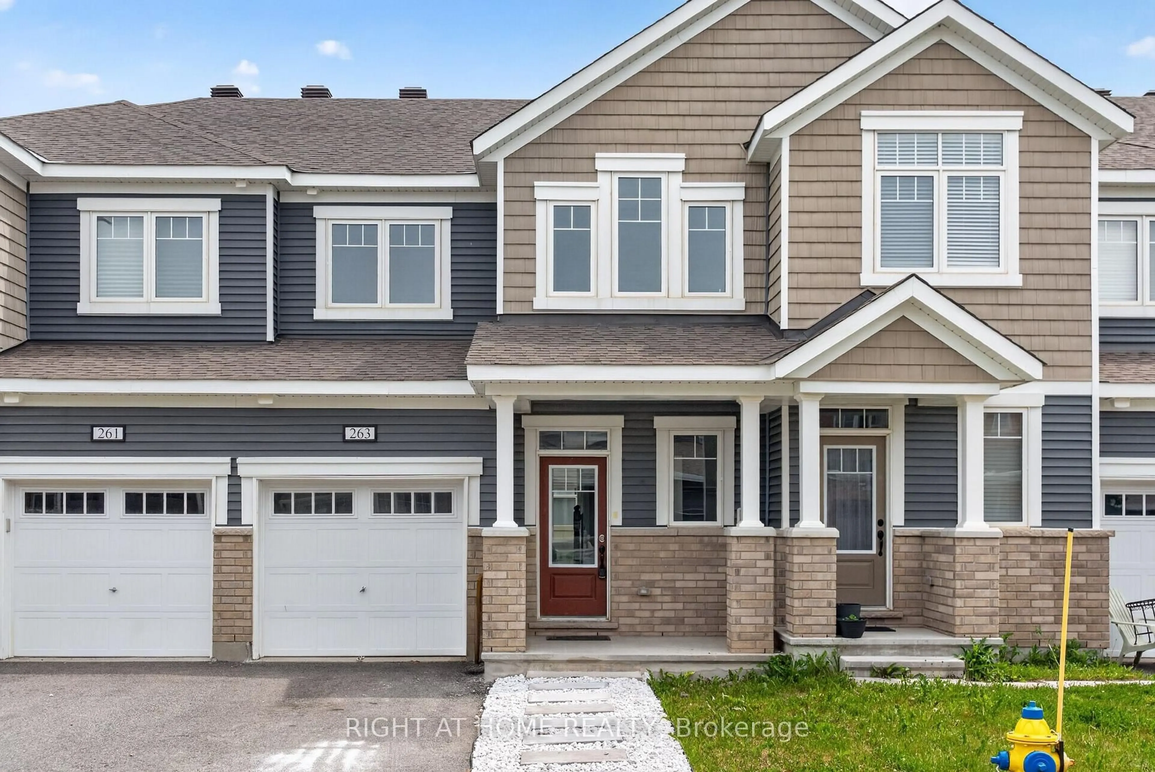 Home with vinyl exterior material, street for 263 Sweetvalley Dr, Ottawa Ontario K4A 5J5