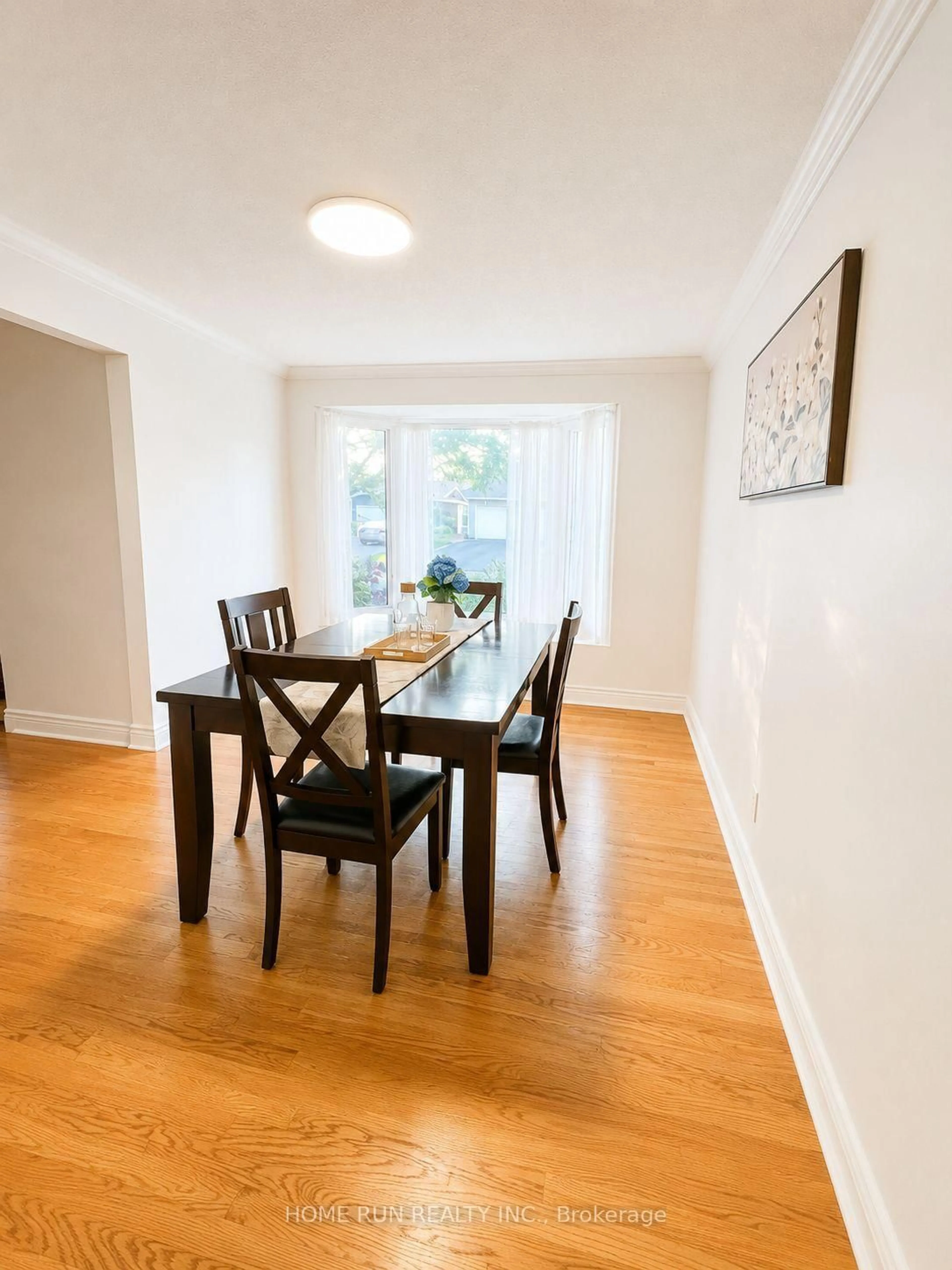 Dining room, wood/laminate floor for 98 Canter Blvd, Ottawa Ontario K2G 2M7