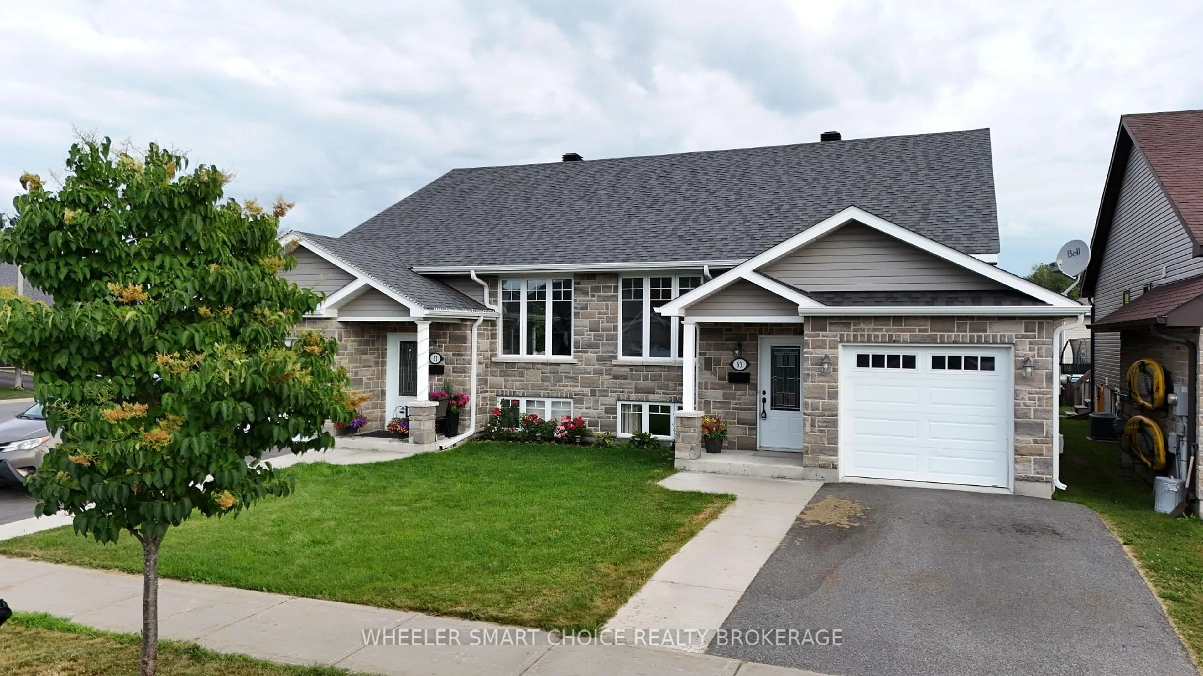 Home with vinyl exterior material, street for 53 Mercier Ave, Cornwall Ontario K6K 0B7