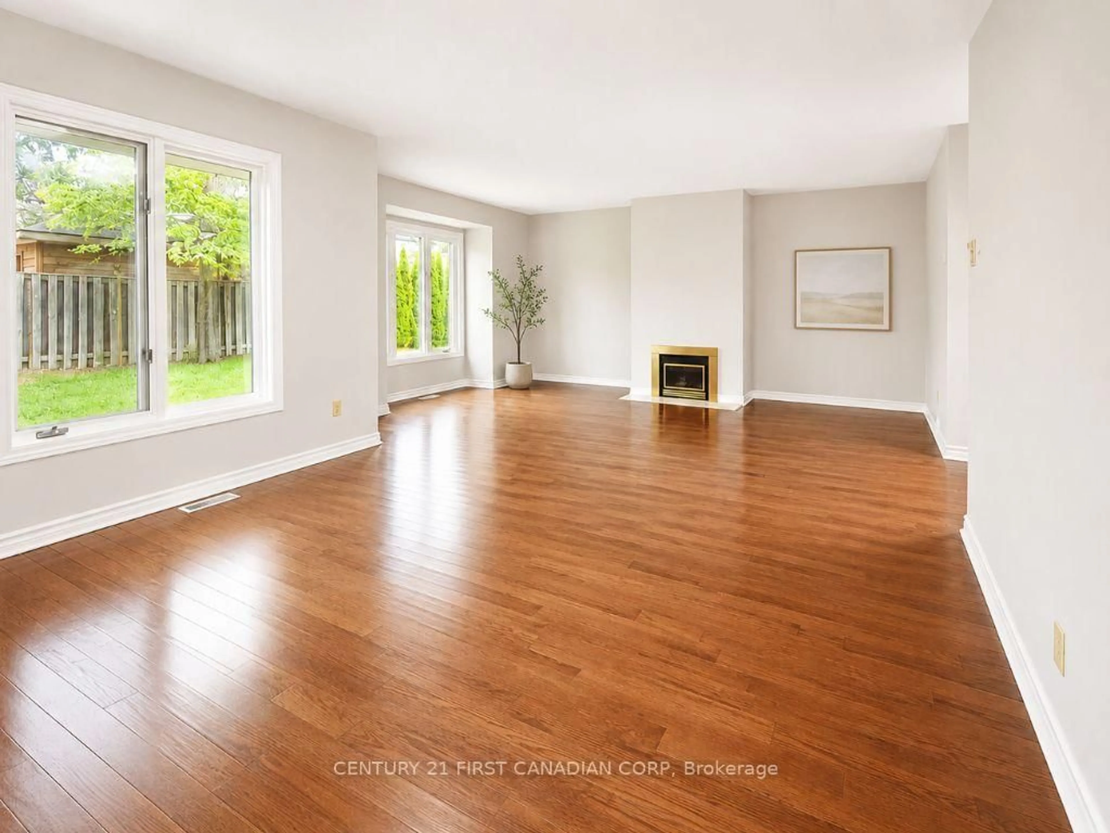 Living room with furniture, wood/laminate floor for 1500 Richmond St #40, London North Ontario N6G 4T7