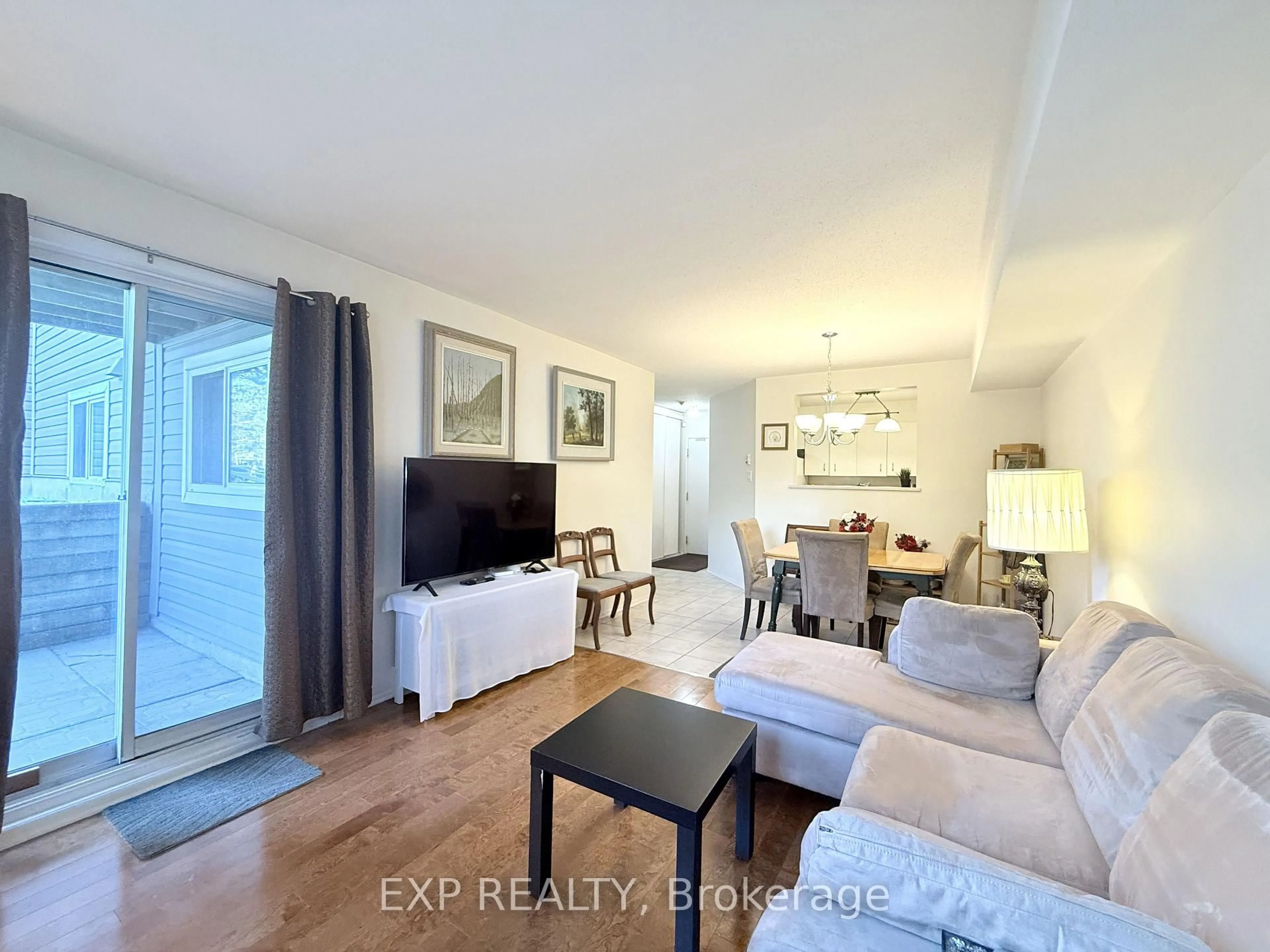 Living room with furniture, unknown for 316 Lorry Greenberg Dr #122, Ottawa Ontario K1T 2P4