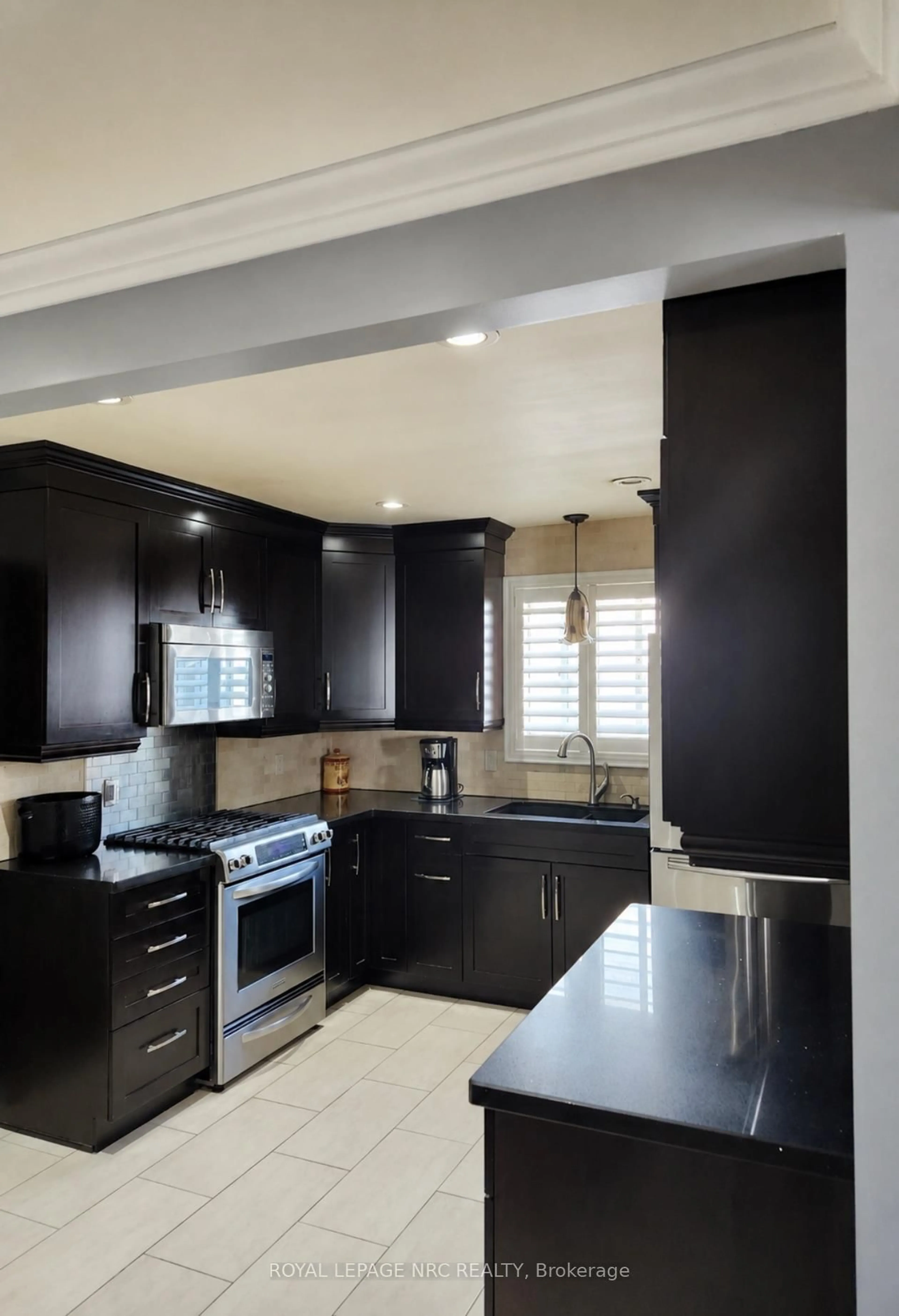 Contemporary kitchen, ceramic/tile floor for 7689 TRACKVIEW St, Niagara Falls Ontario L2H 2Z6
