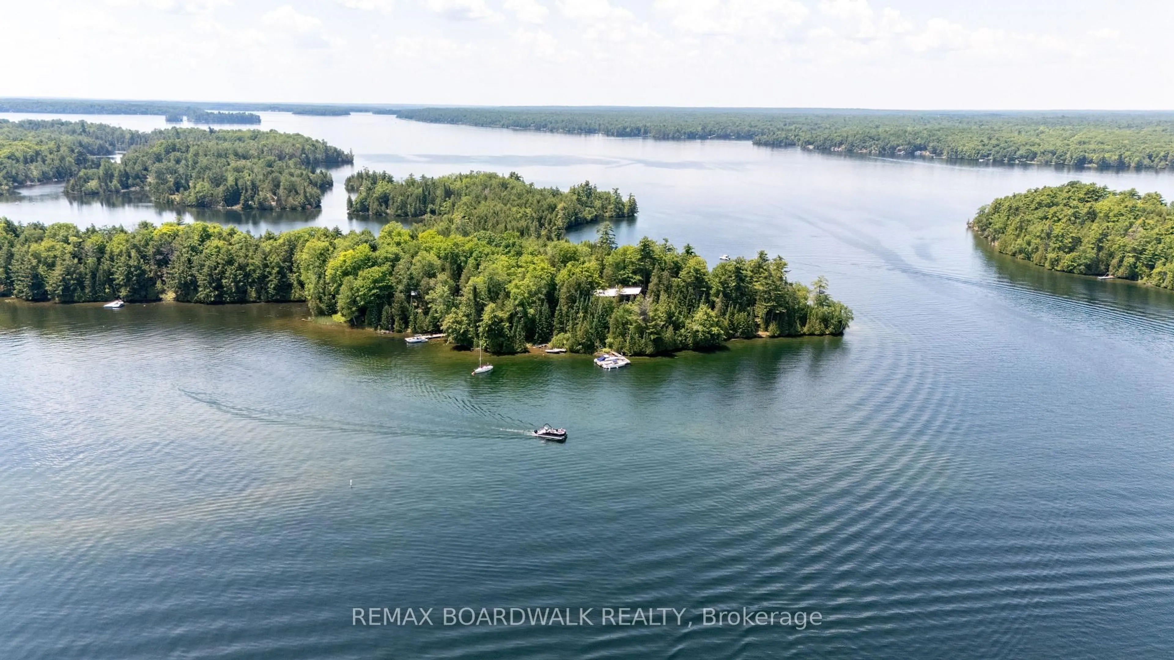 A pic from outside/outdoor area/front of a property/back of a property/a pic from drone, water/lake/river/ocean view for 6603 Big Rideau Island, Rideau Lakes Ontario K0G 1V0