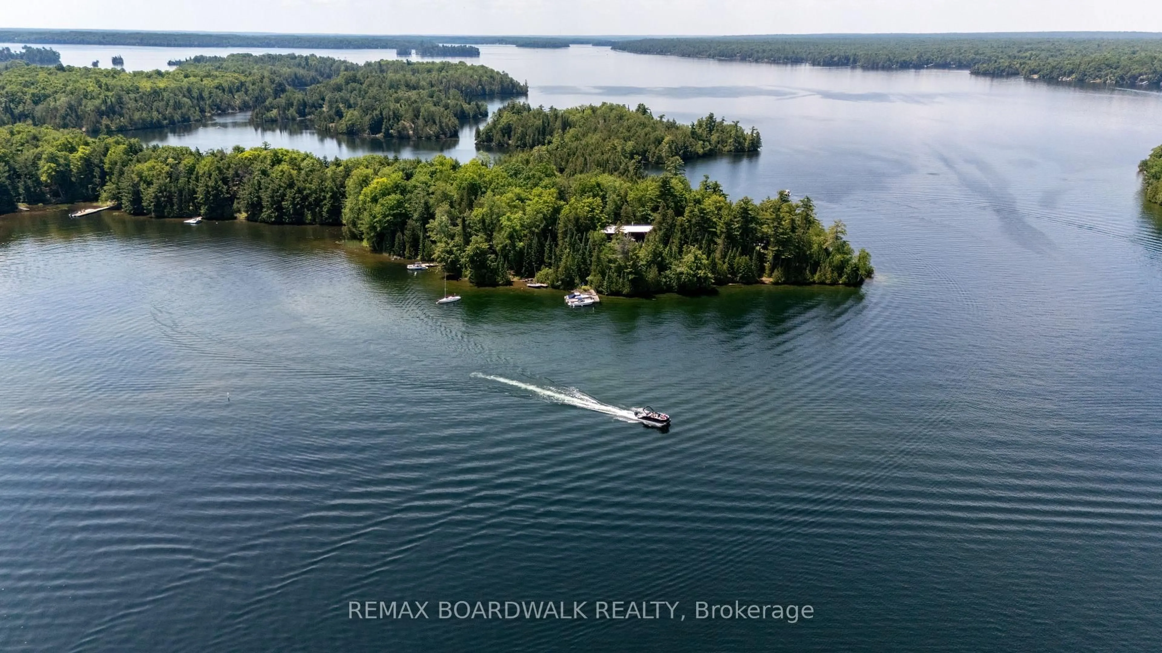 A pic from outside/outdoor area/front of a property/back of a property/a pic from drone, water/lake/river/ocean view for 6603 Big Rideau Island, Rideau Lakes Ontario K0G 1V0