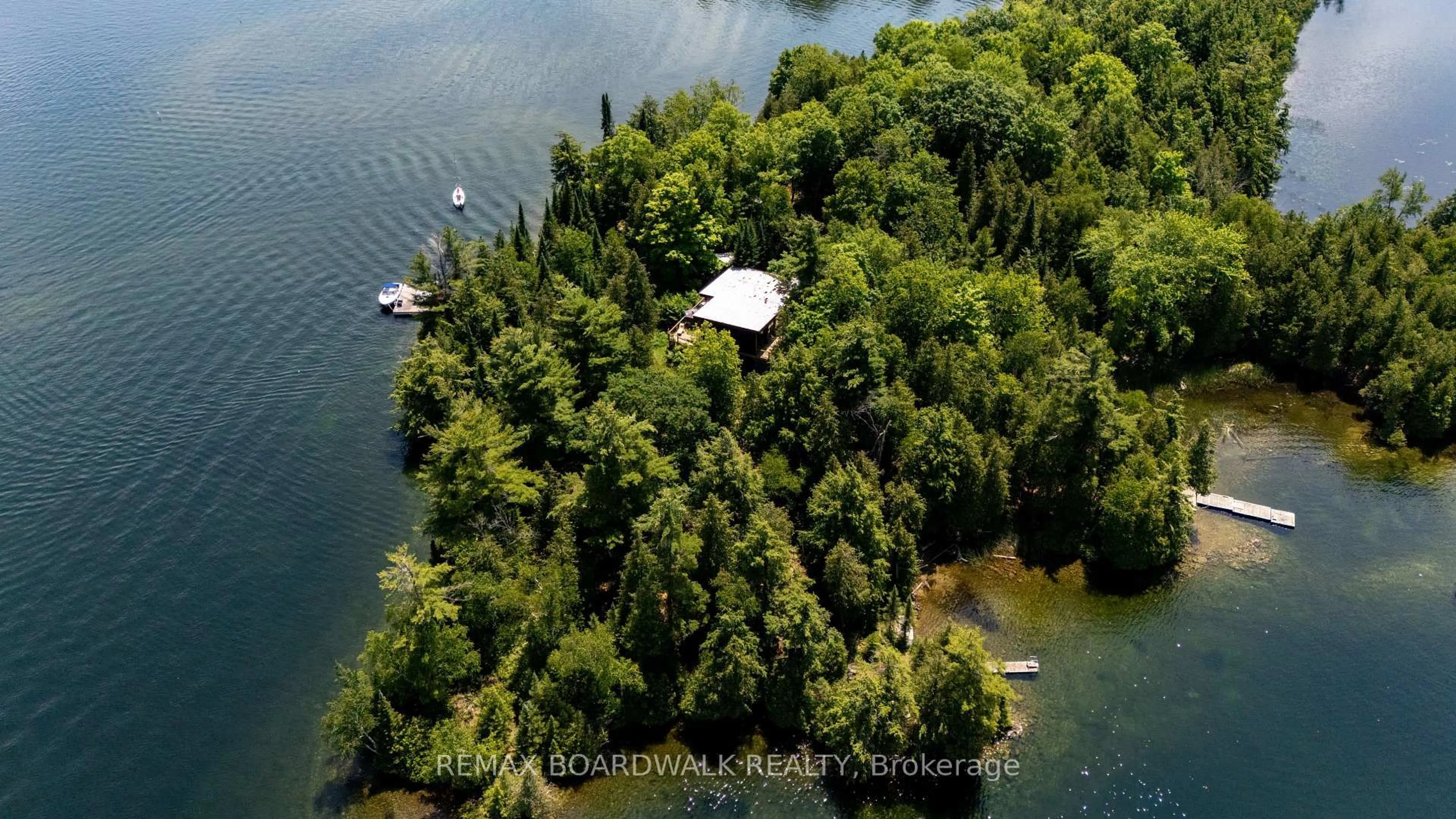 A pic from outside/outdoor area/front of a property/back of a property/a pic from drone, water/lake/river/ocean view for 6603 Big Rideau Island, Rideau Lakes Ontario K0G 1V0