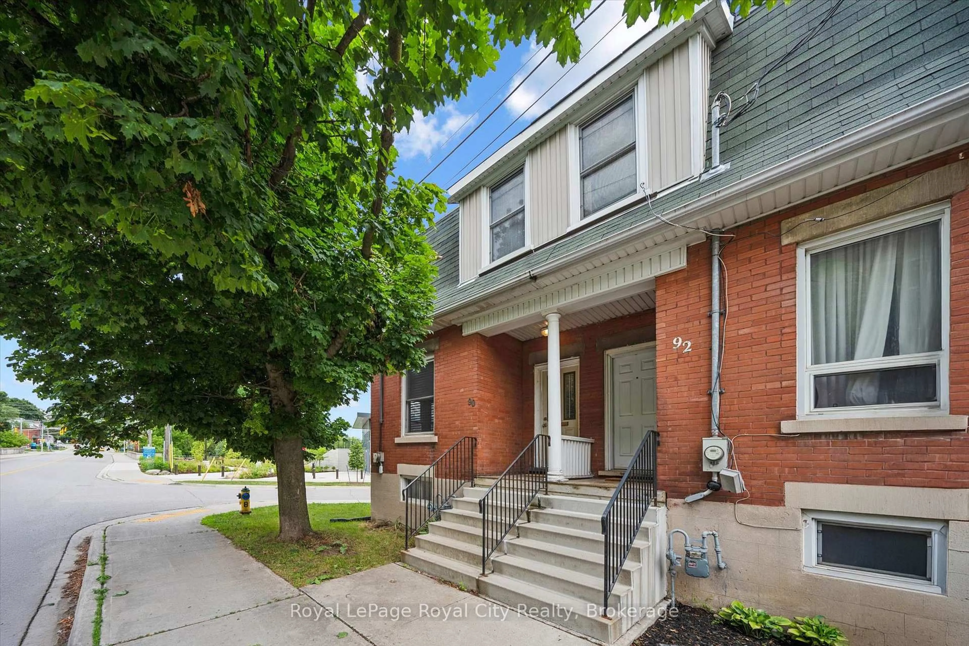 Home with brick exterior material, street for 90 Neeve St, Guelph Ontario N1E 5S1