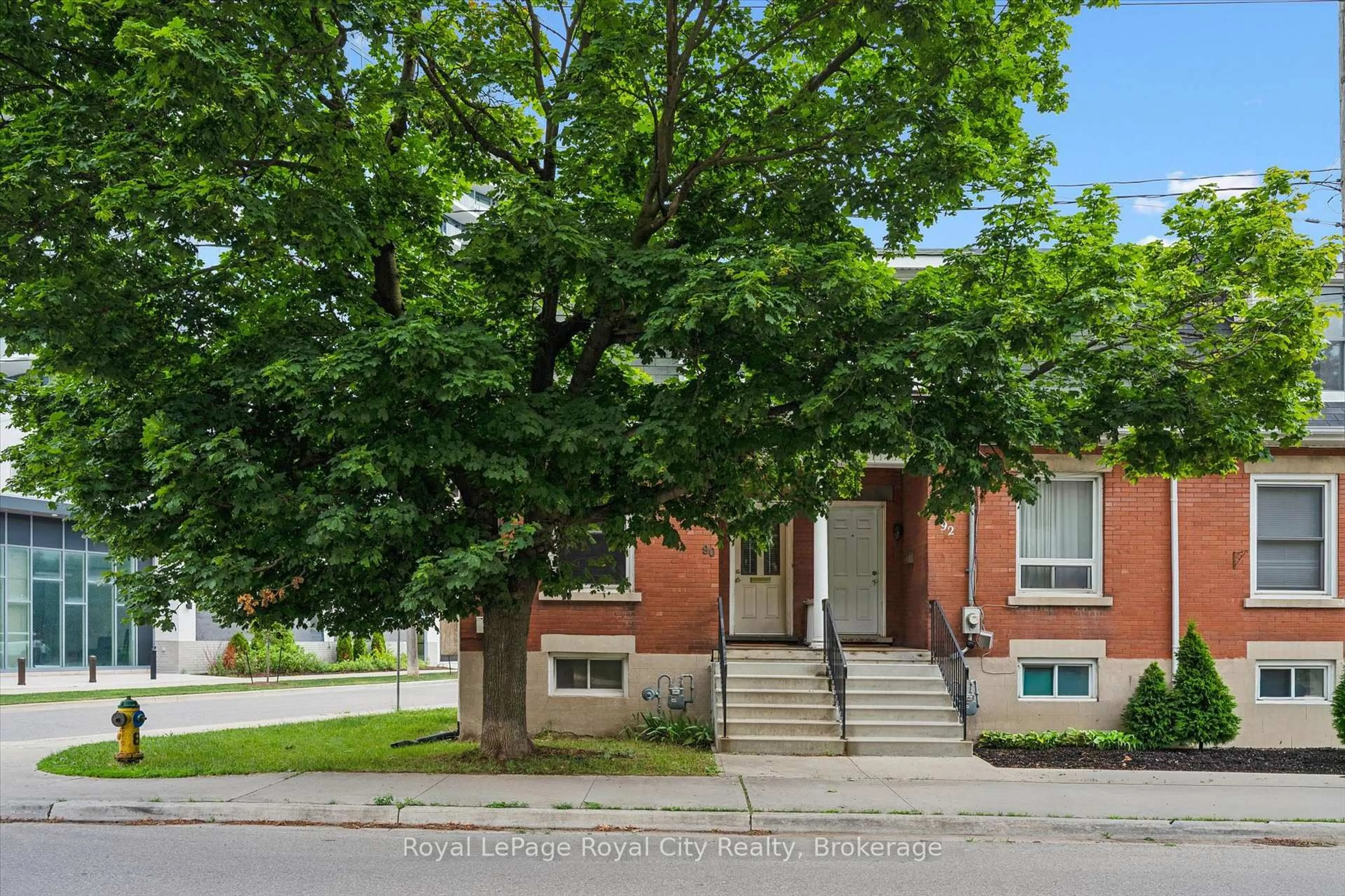 Home with brick exterior material, street for 90 Neeve St, Guelph Ontario N1E 5S1