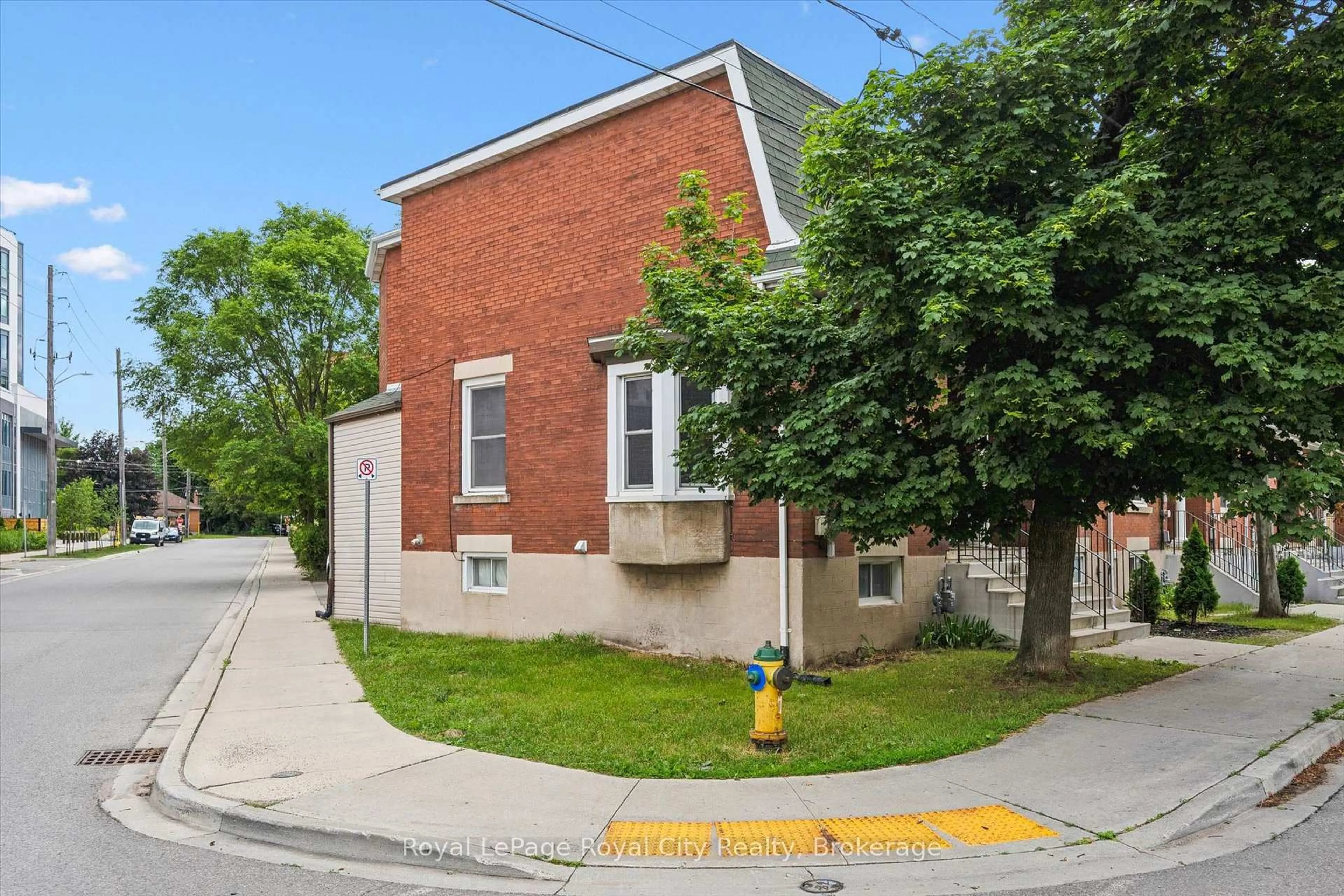 Home with brick exterior material, street for 90 Neeve St, Guelph Ontario N1E 5S1