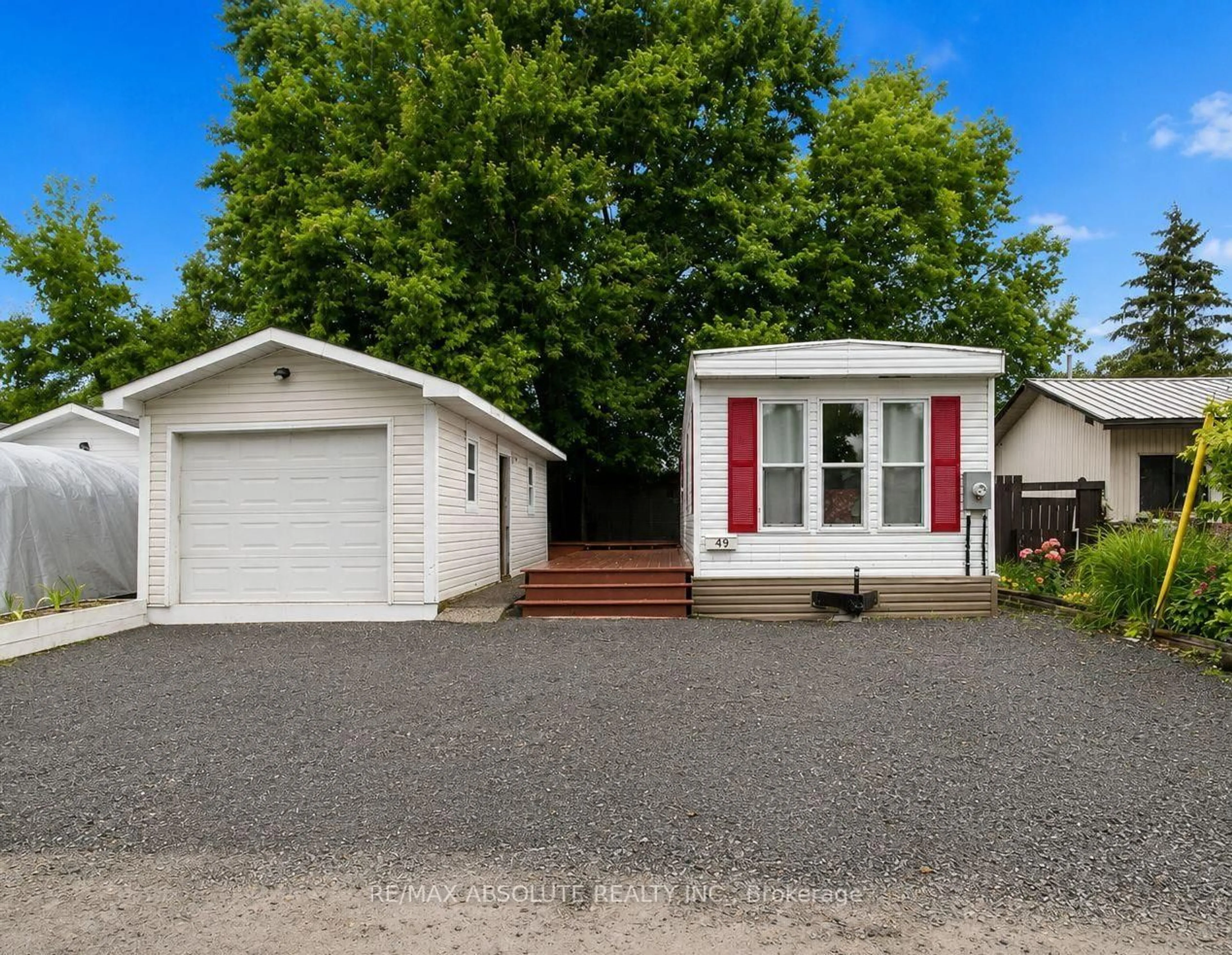 Home with vinyl exterior material, street for 3535 St. Joseph Blvd #49, Ottawa Ontario K2H 8S1
