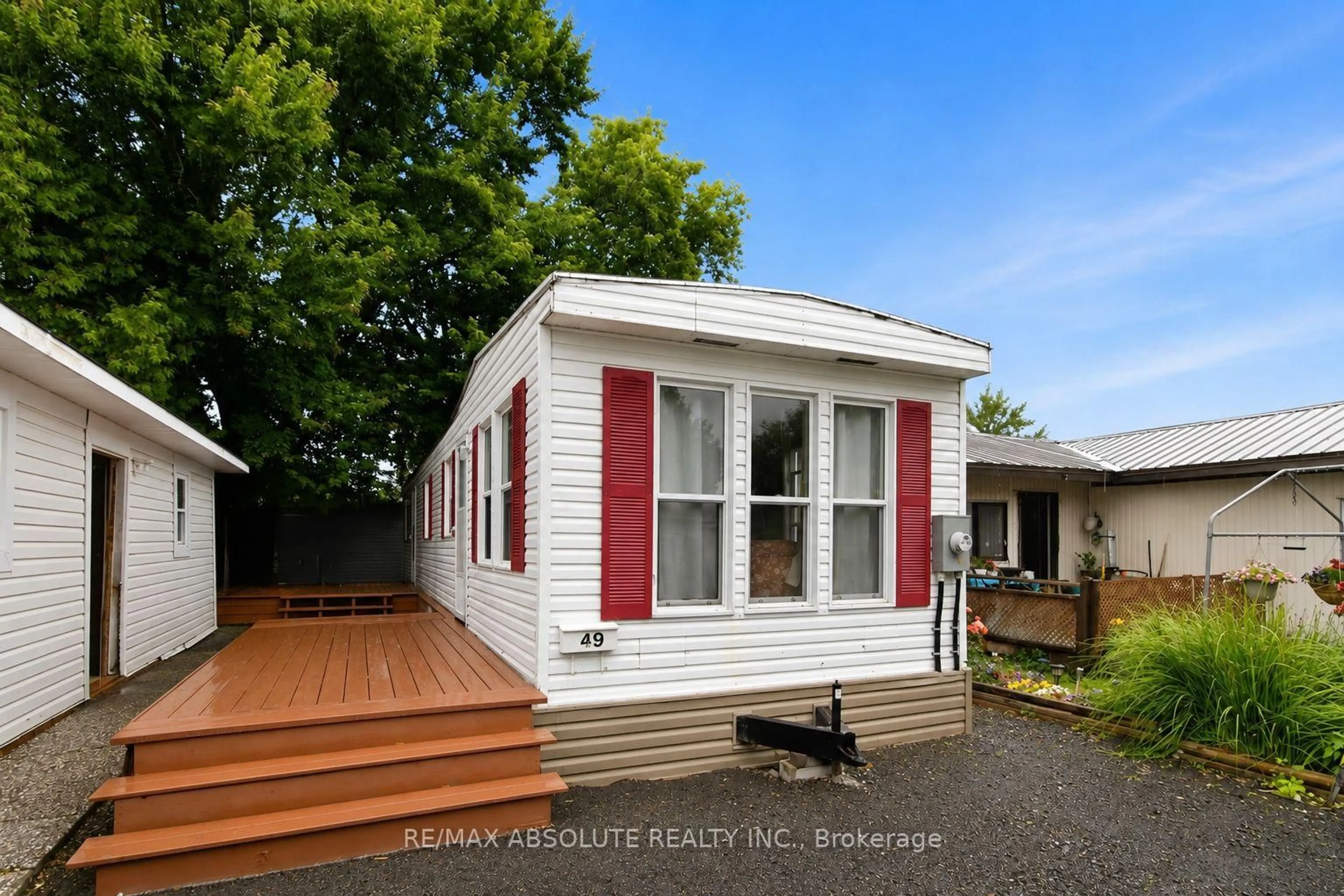 Home with vinyl exterior material, street for 3535 St. Joseph Blvd #49, Ottawa Ontario K2H 8S1