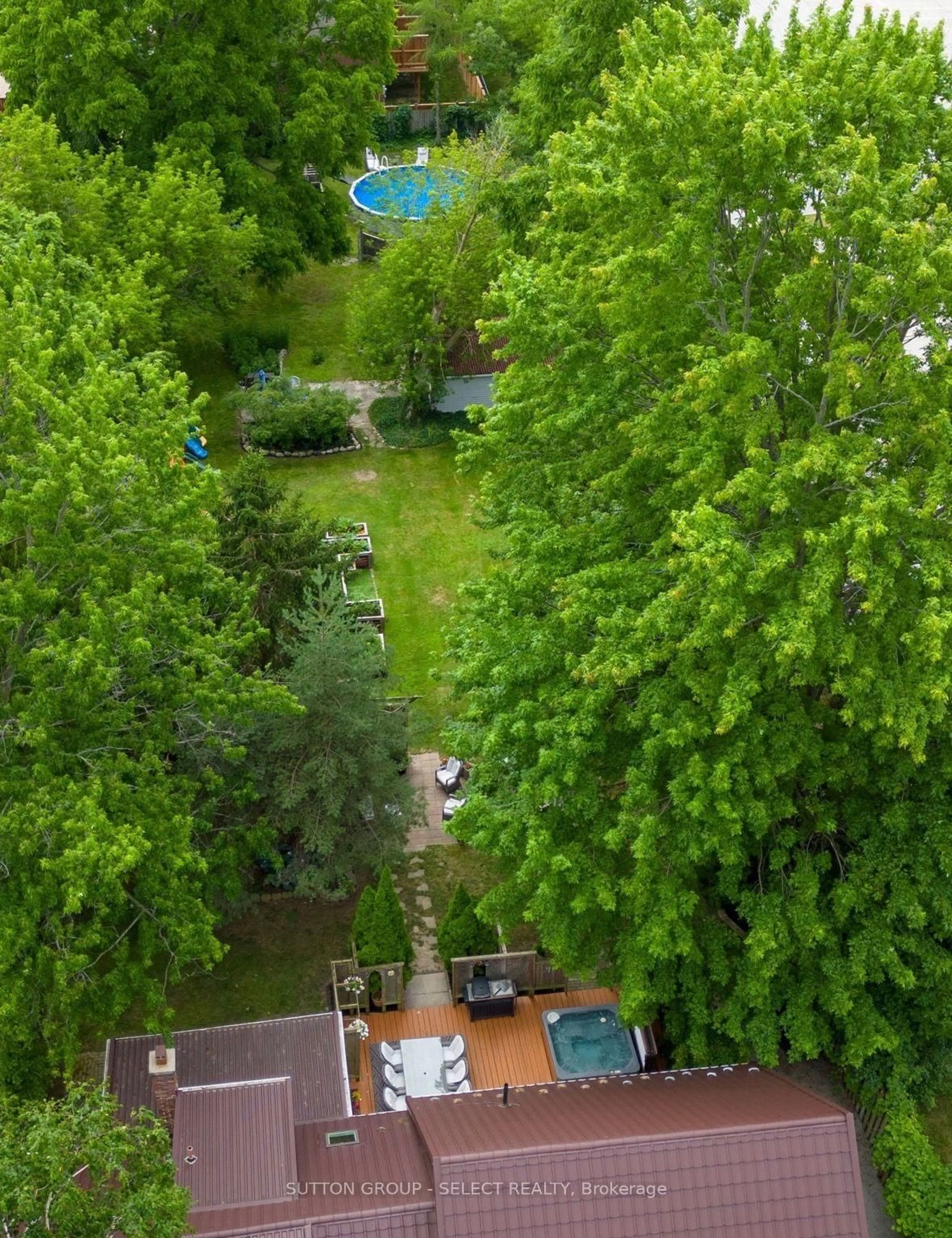 A pic from outside/outdoor area/front of a property/back of a property/a pic from drone, forest/trees view for 1129 Sunningdale Rd, London North Ontario N5X 4B1