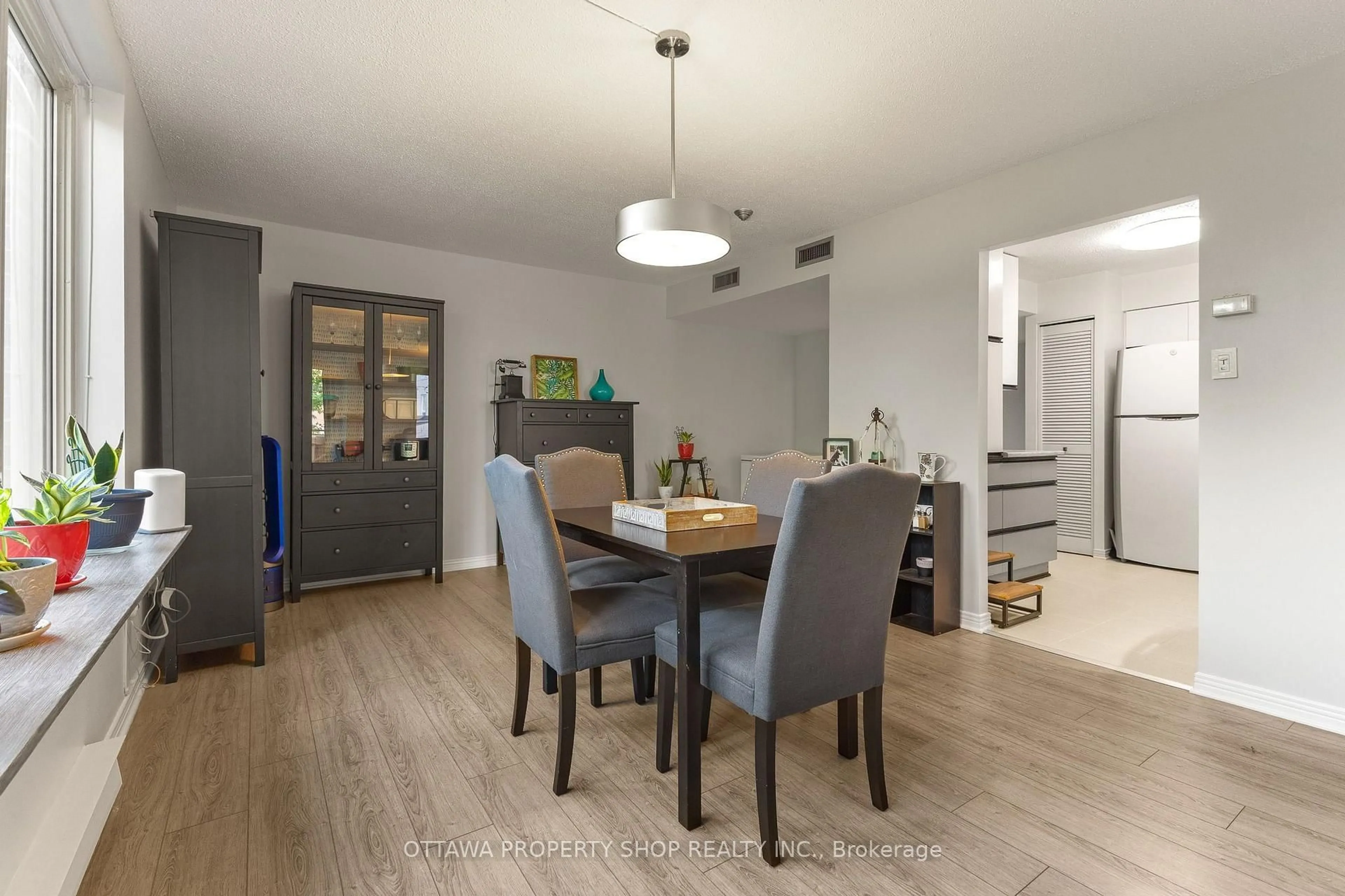 Dining room, wood/laminate floor for 800 Mckellar Ave #204, Ottawa Ontario K2A 2X5