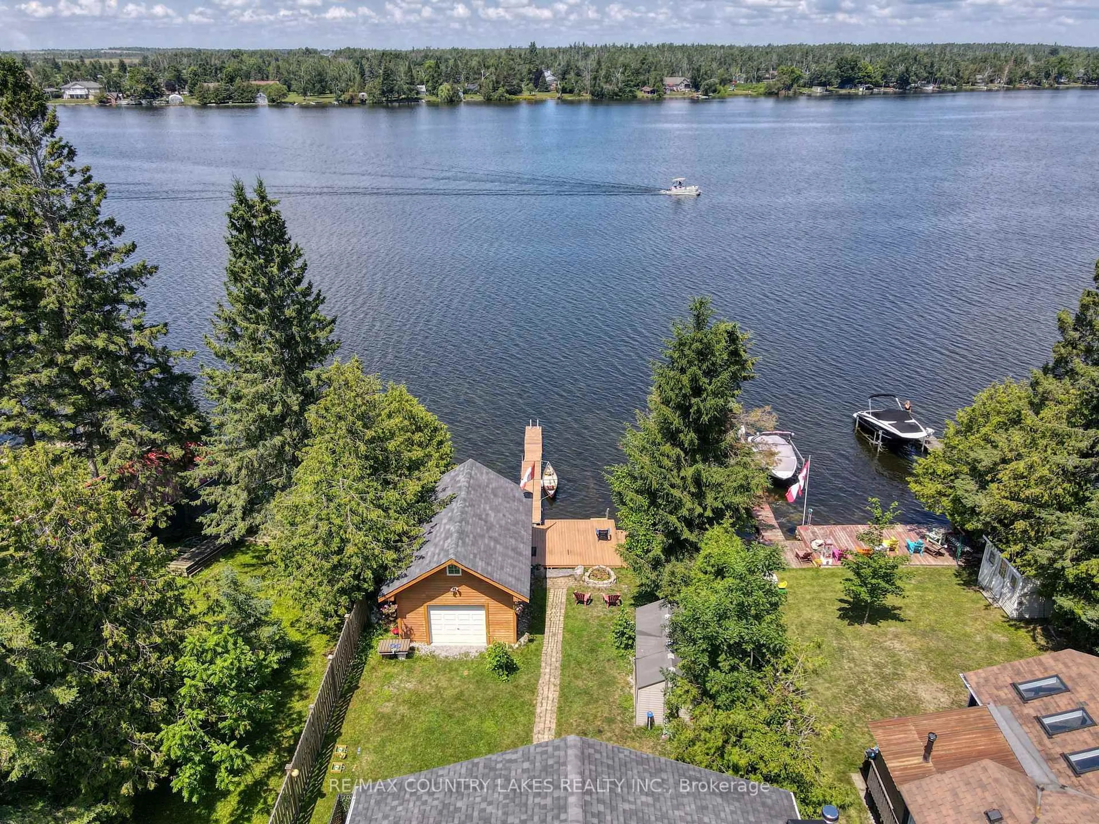 A pic from outside/outdoor area/front of a property/back of a property/a pic from drone, water/lake/river/ocean view for 87 Paradise Rd, Kawartha Lakes Ontario K0M 1B0