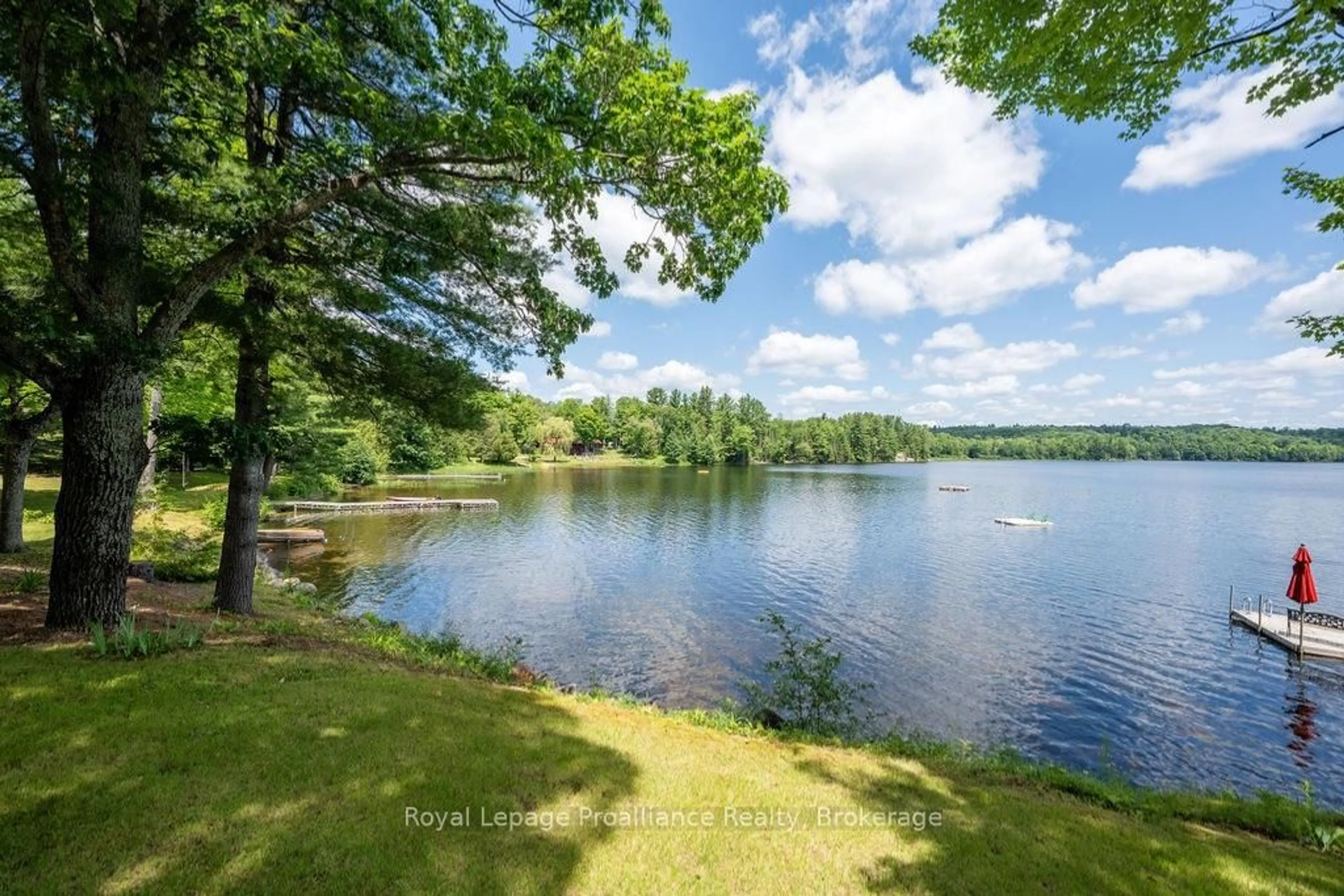 A pic from outside/outdoor area/front of a property/back of a property/a pic from drone, water/lake/river/ocean view for 1147A Flyers Cove Lane, Plevna Ontario K0H 2M0