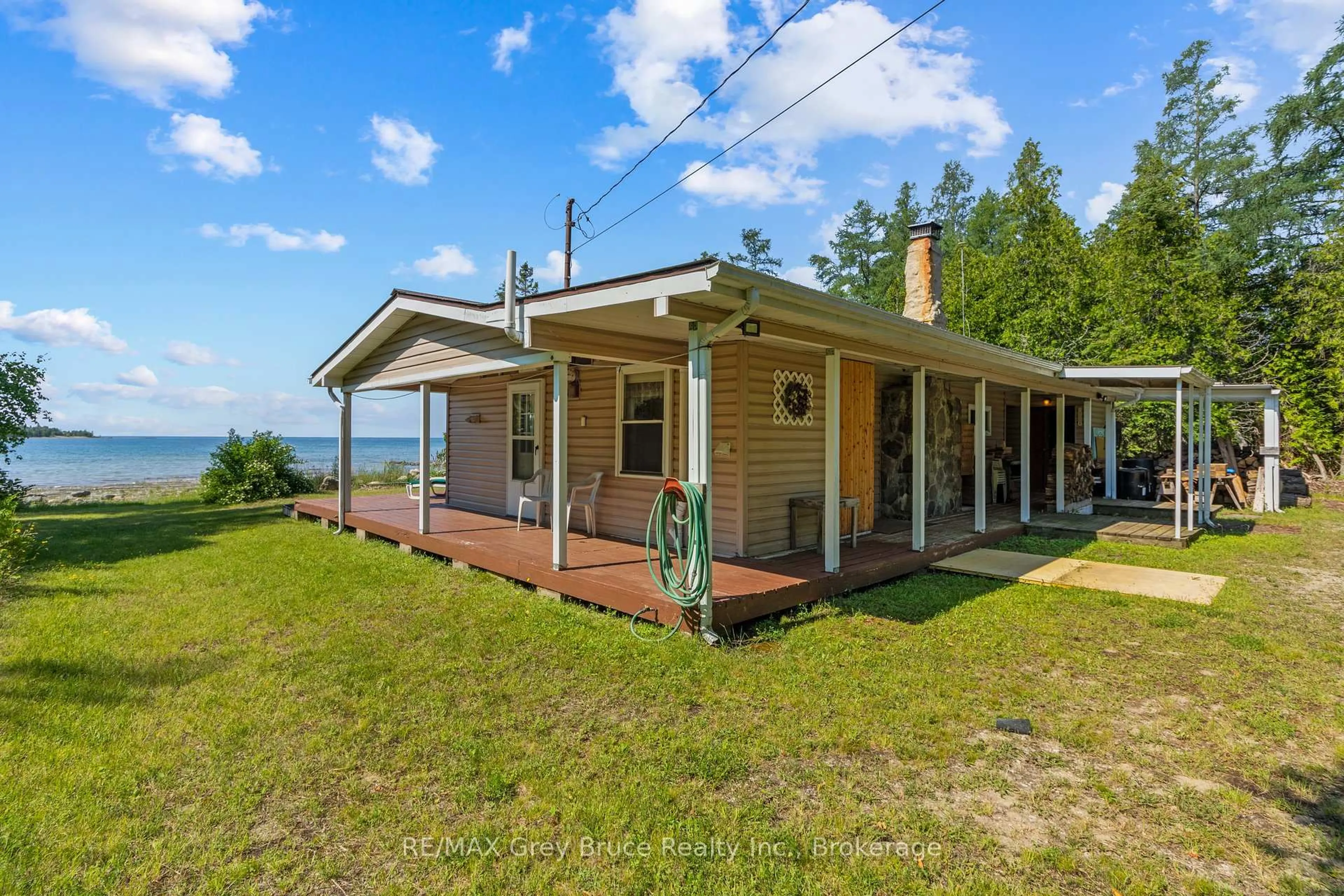 A pic from outside/outdoor area/front of a property/back of a property/a pic from drone, water/lake/river/ocean view for 626 Warner Bay Rd, Northern Bruce Peninsula Ontario N0H 2R0