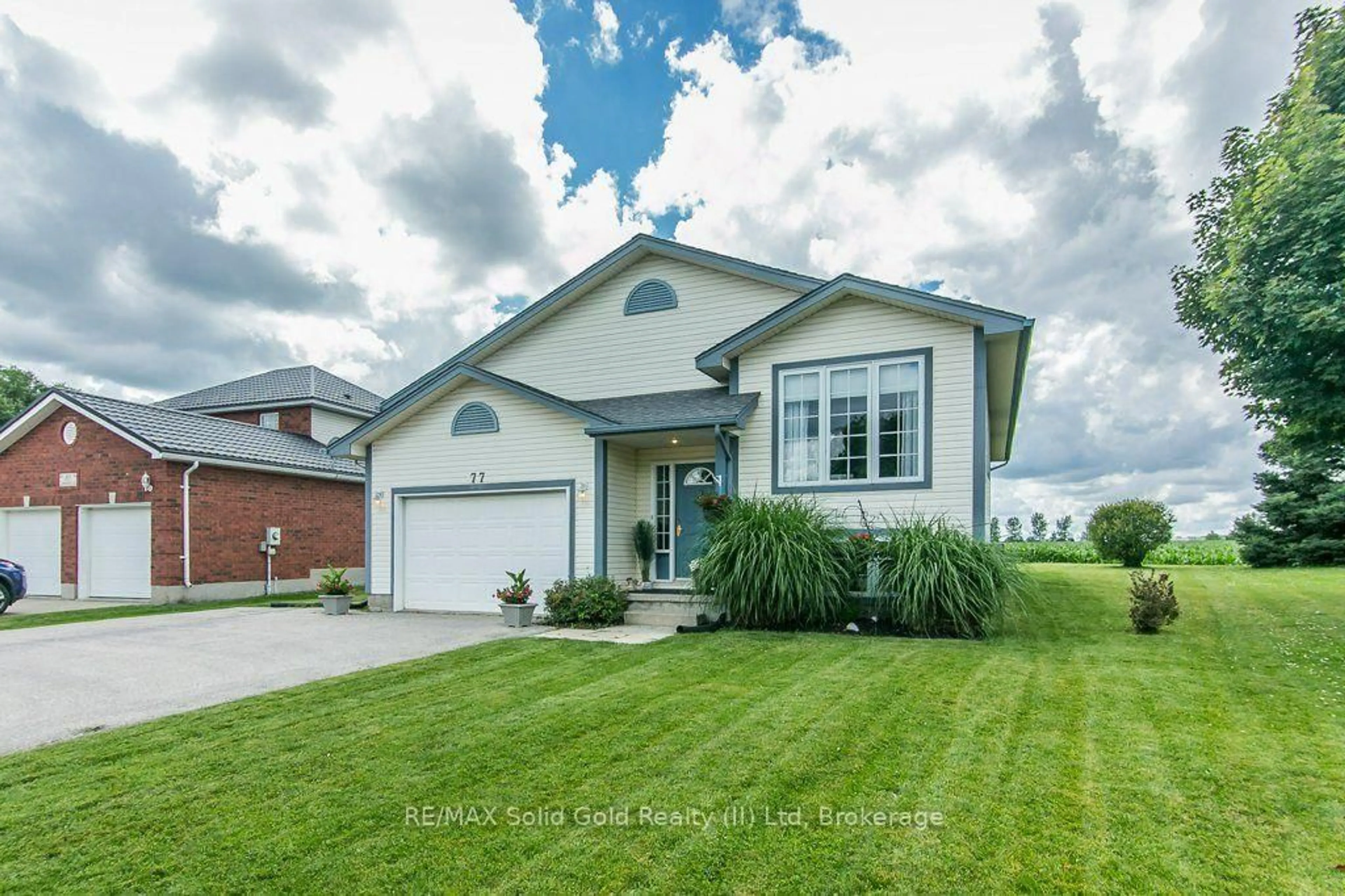 Home with vinyl exterior material, street for 77 Lawrence St, Wellesley Ontario N0B 2T0