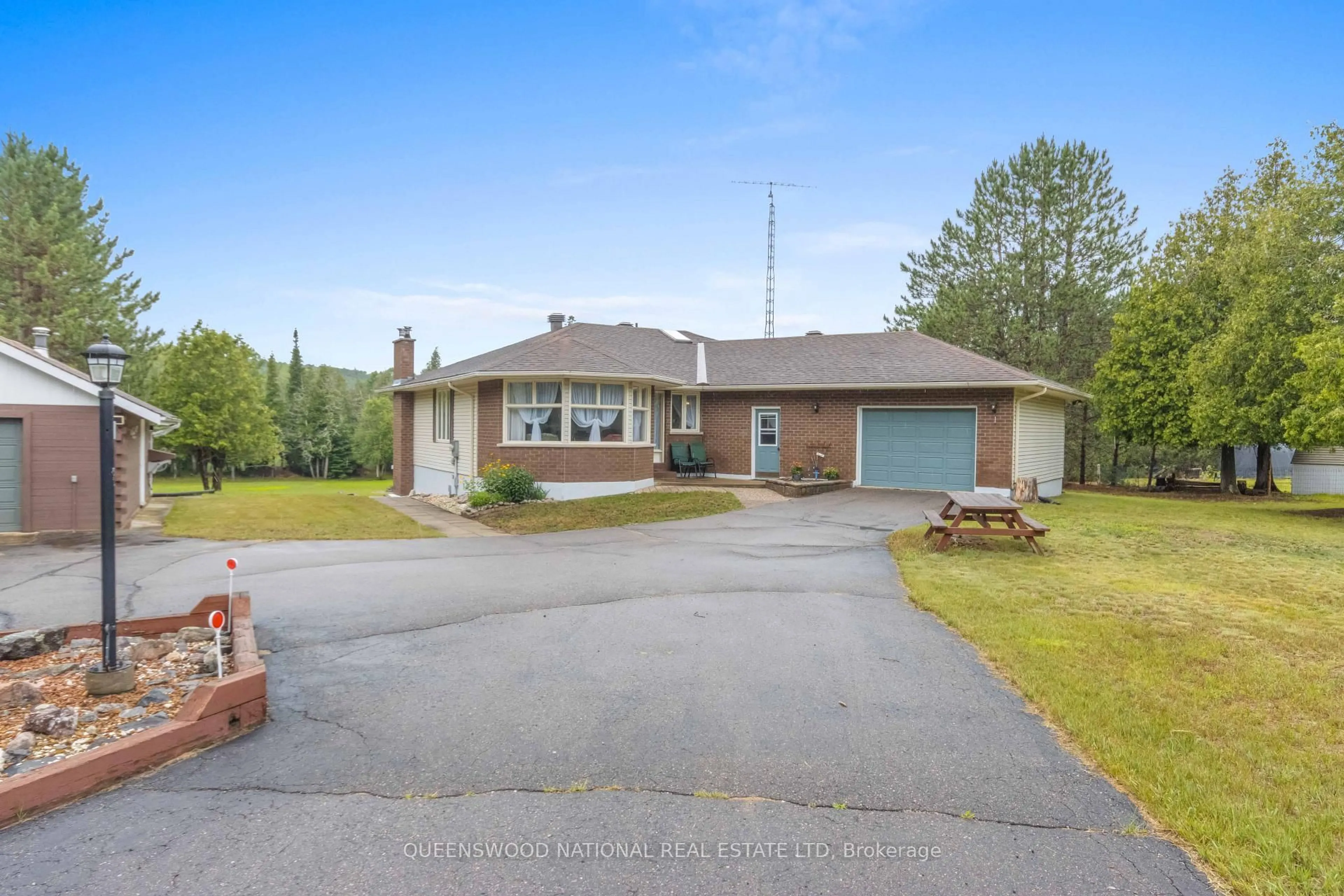A pic from outside/outdoor area/front of a property/back of a property/a pic from drone, street for 7424 River Rd, Palmer Rapids Ontario K0J 2E0