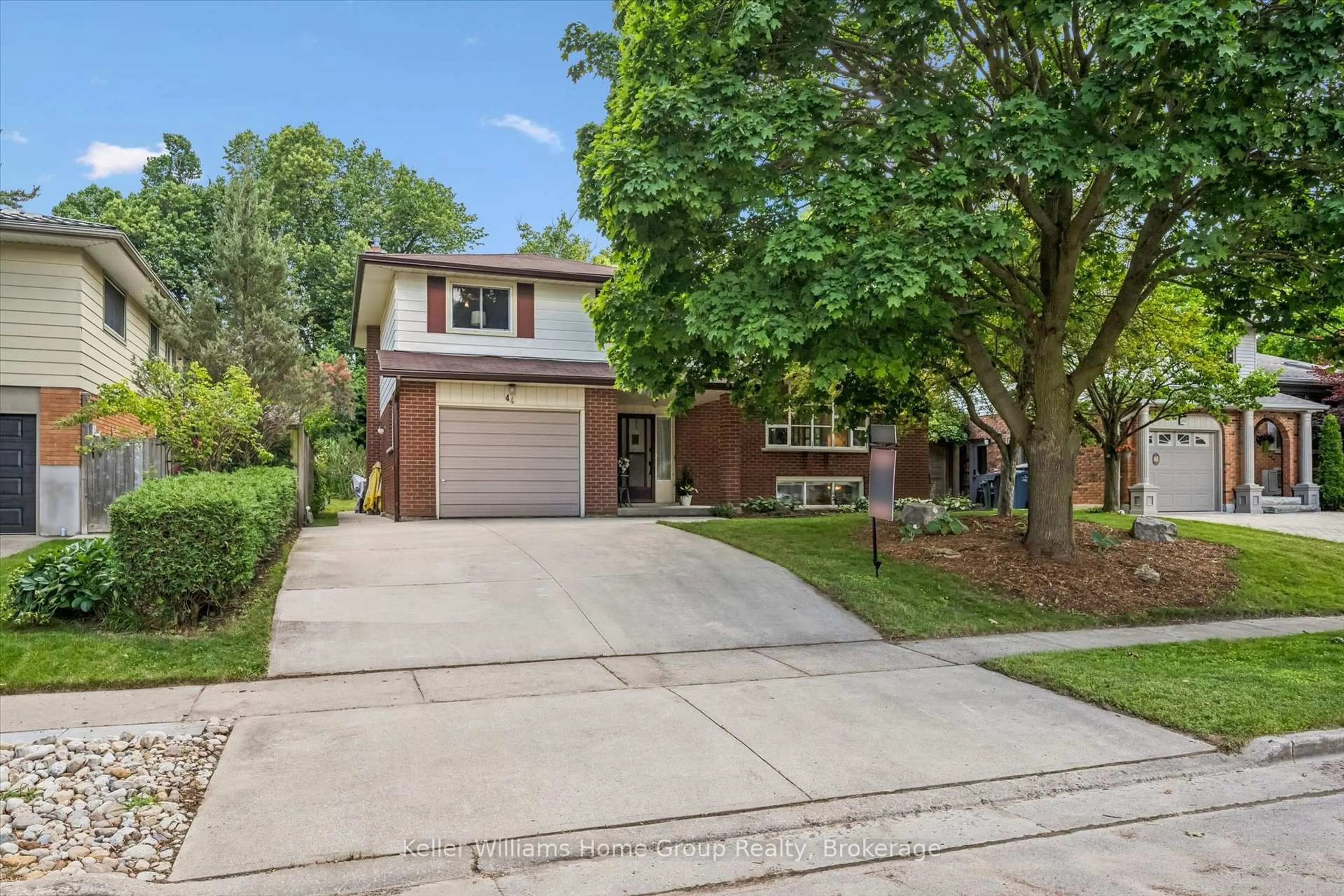 Home with brick exterior material, street for 44 Sherwood Dr, Guelph Ontario N1E 1R6