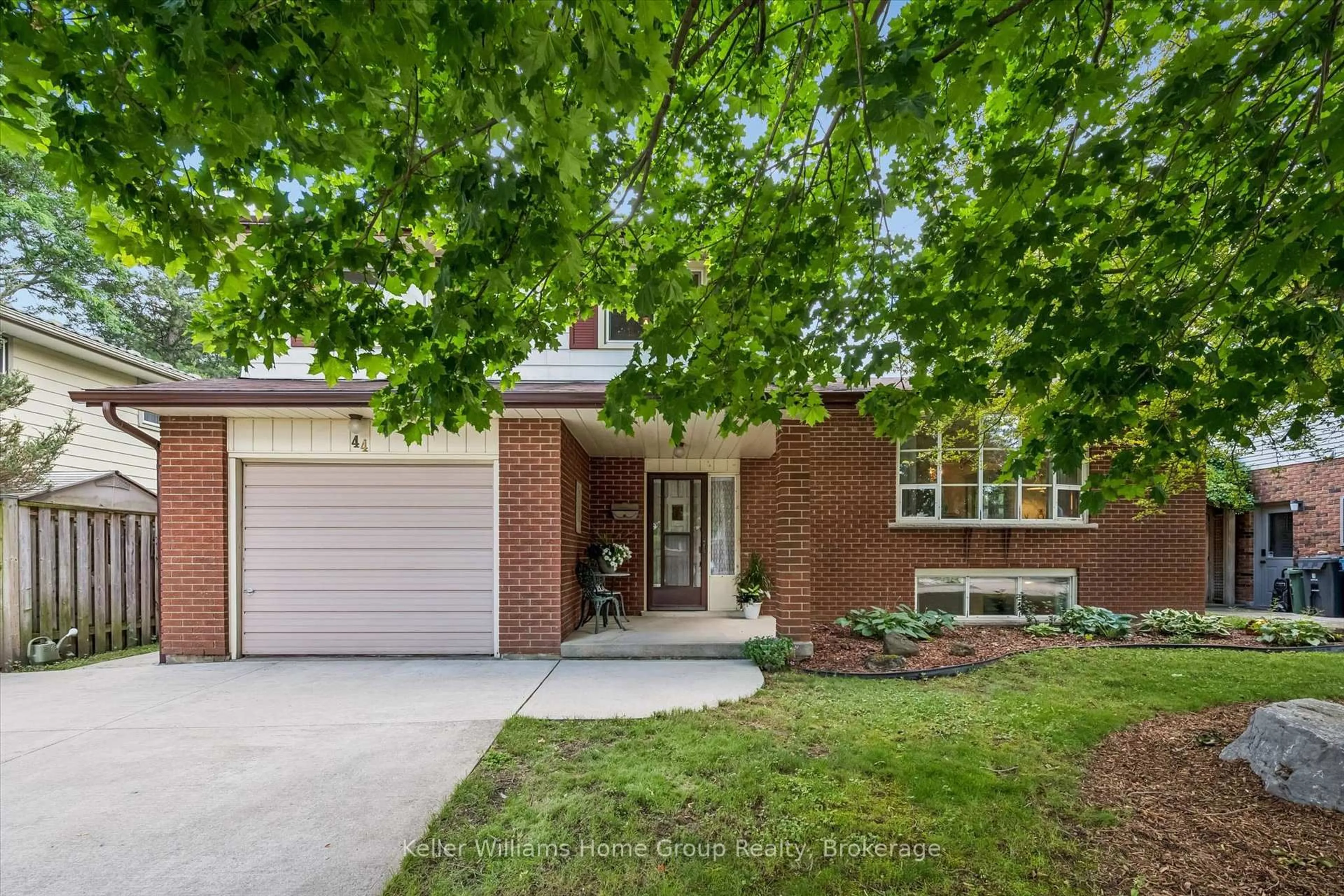 Home with brick exterior material, street for 44 Sherwood Dr, Guelph Ontario N1E 1R6