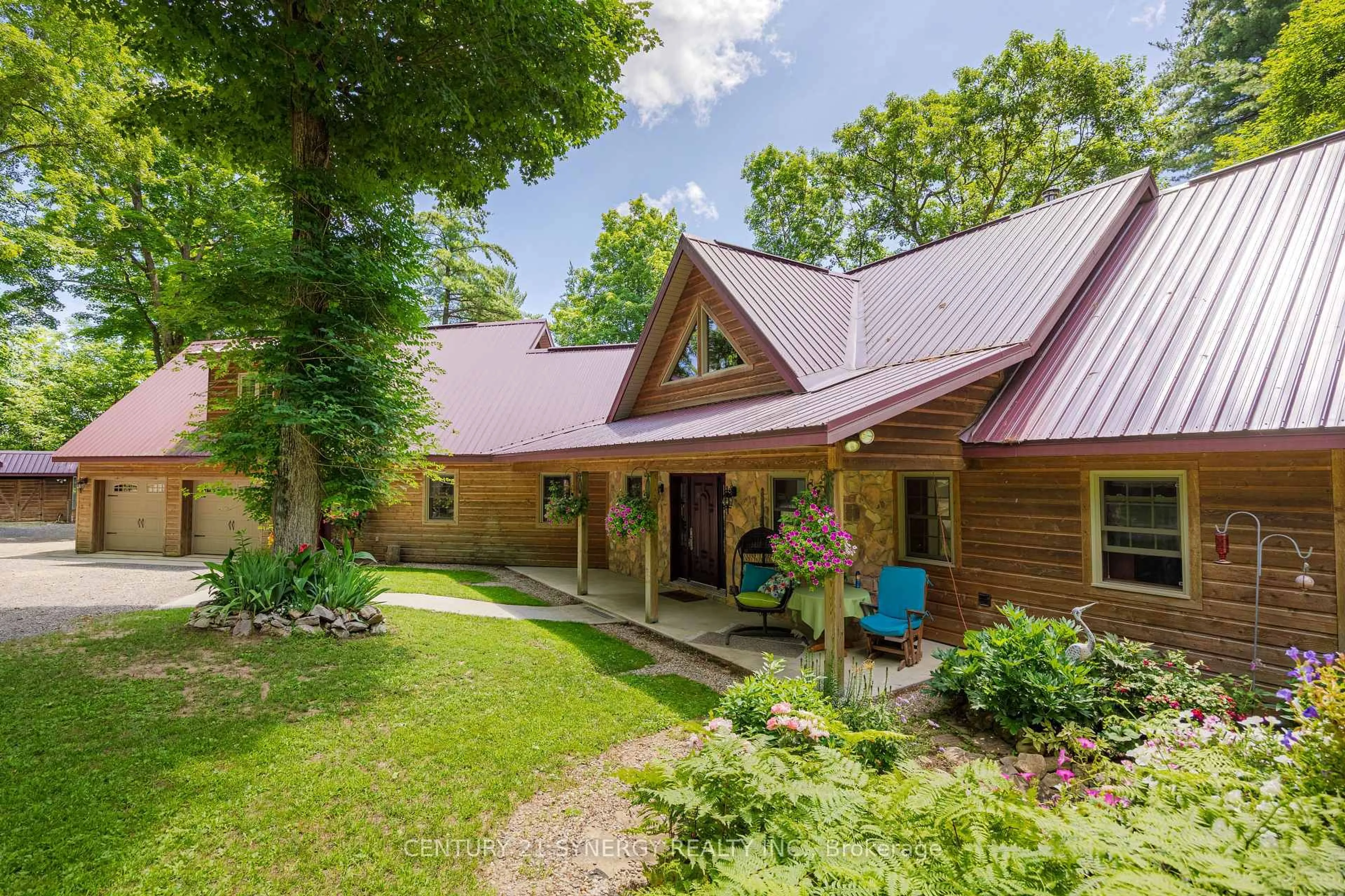 A pic from outside/outdoor area/front of a property/back of a property/a pic from drone, mountain view for 182 LB1 Rd, Rideau Lakes Ontario K0G 1E0