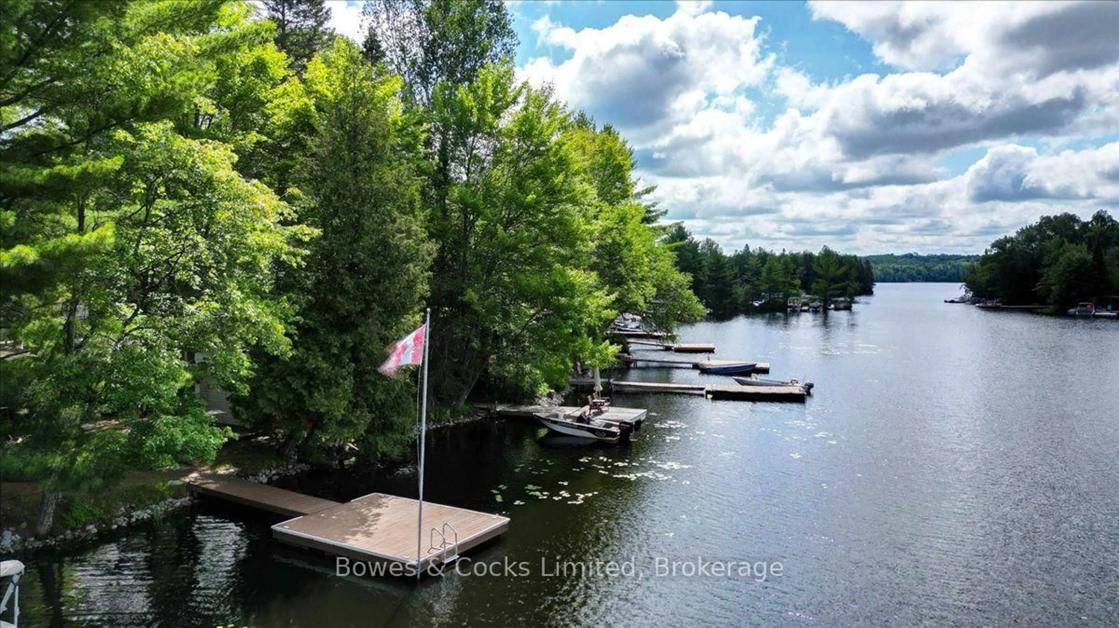 A pic from outside/outdoor area/front of a property/back of a property/a pic from drone, water/lake/river/ocean view for R2-1123 Homestead Rd, Highlands East Ontario K0L 1C0