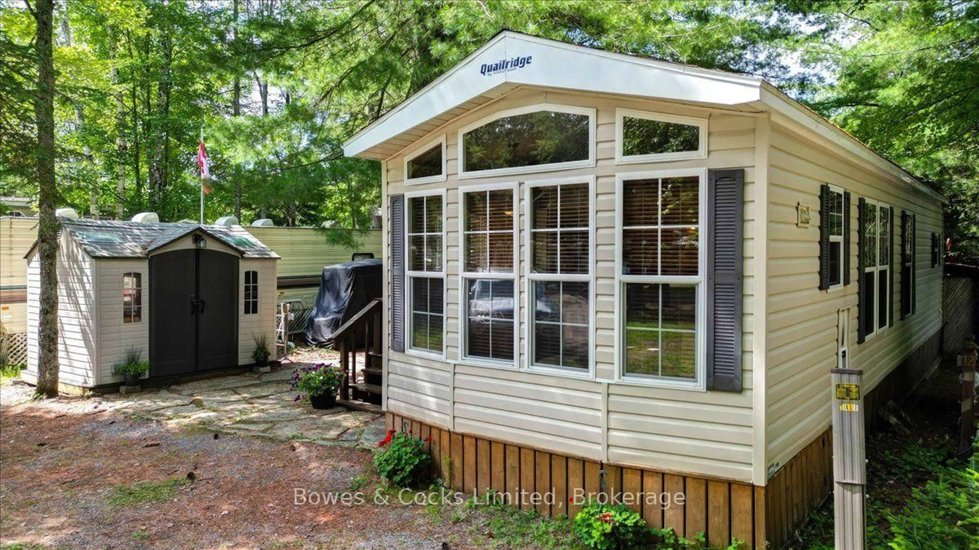 Home with vinyl exterior material, street for R2-1123 Homestead Rd, Highlands East Ontario K0L 1C0