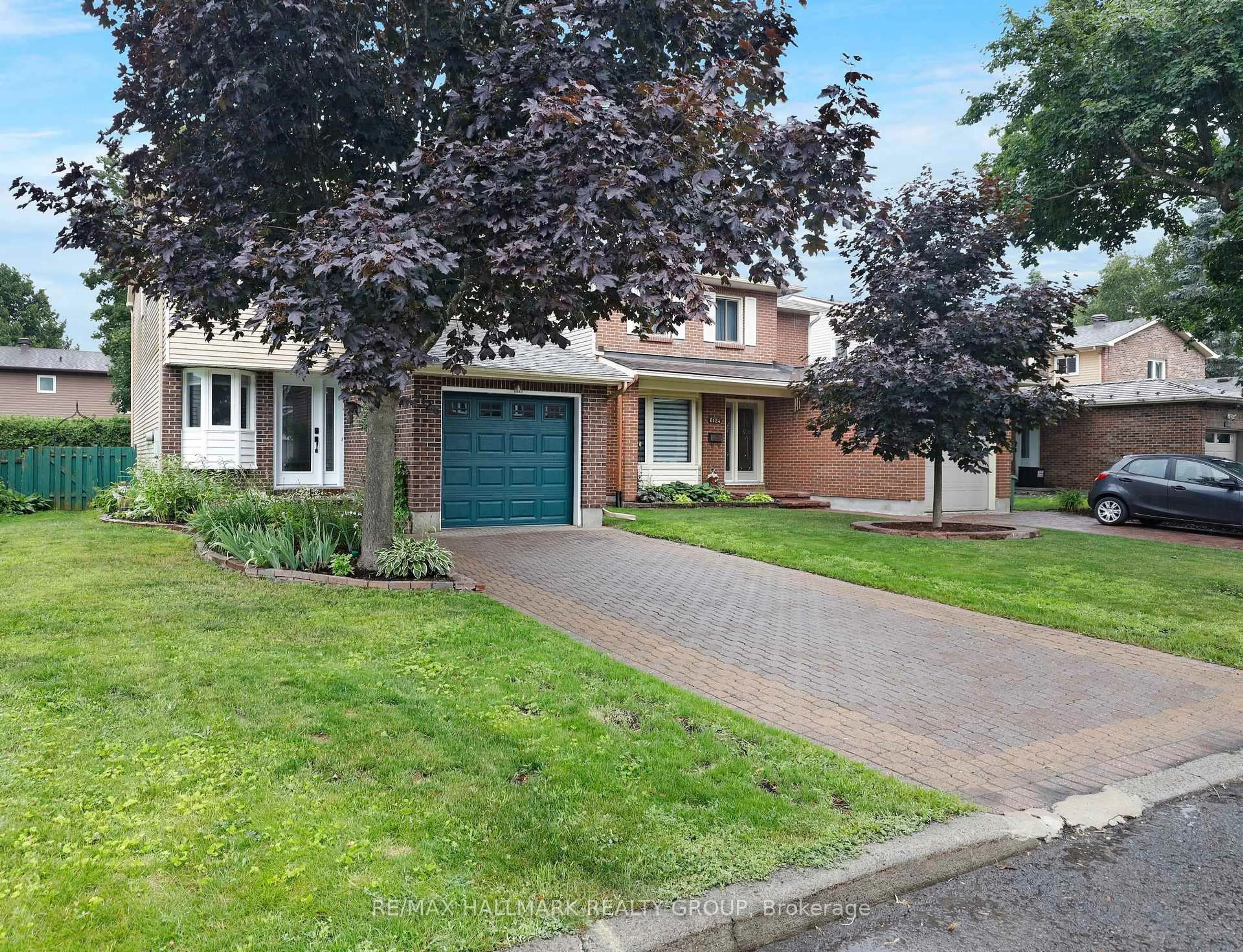 Home with brick exterior material, street for 6126 Rivermill Cres, Ottawa Ontario K1C 5M9