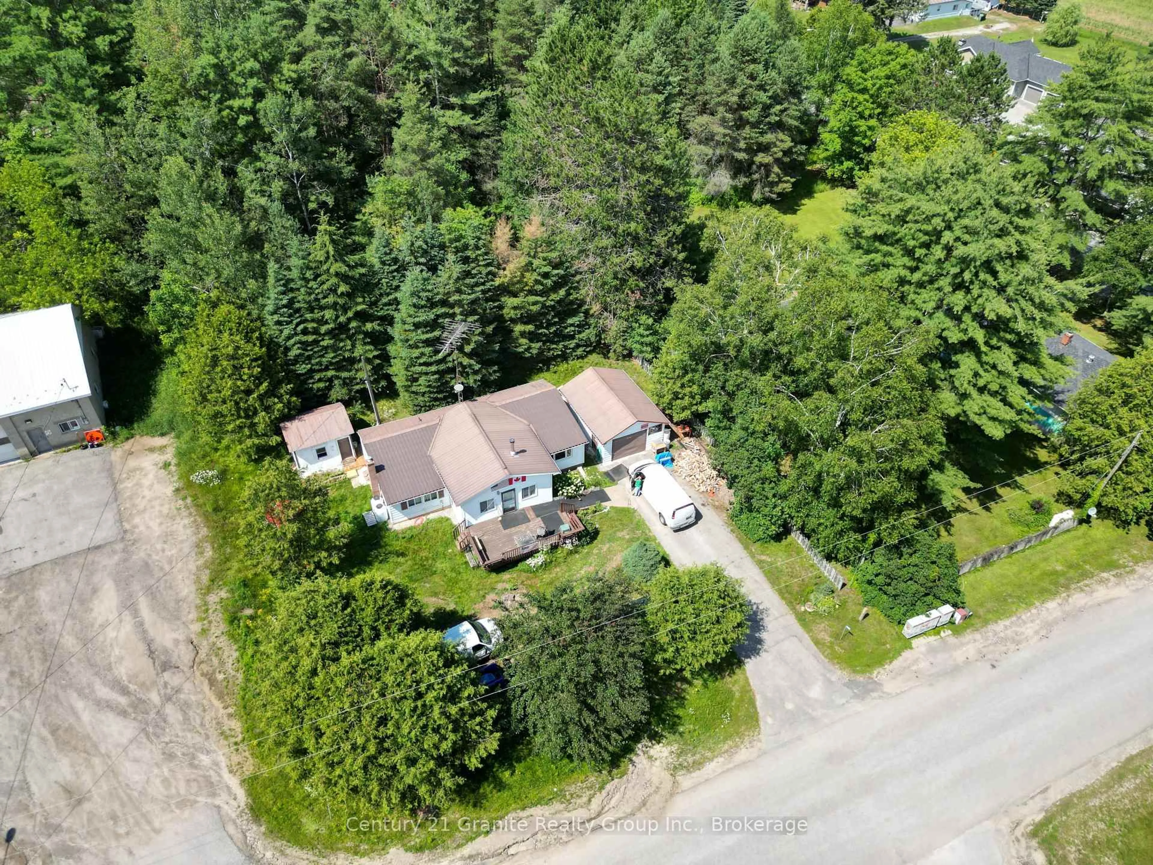 A pic from outside/outdoor area/front of a property/back of a property/a pic from drone, street for 1993 Fleming Rd, Minden Hills Ontario K0M 2K0